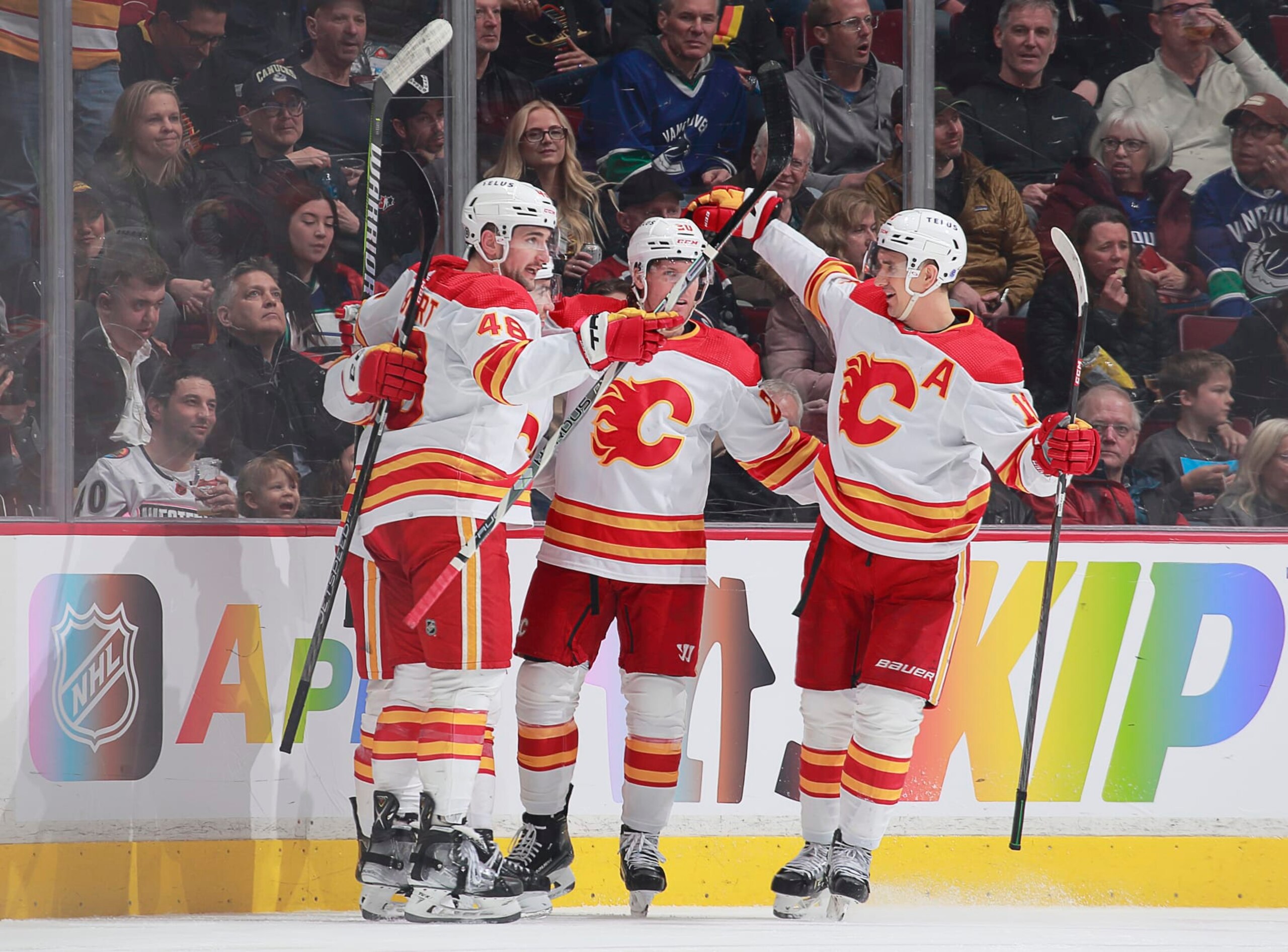 VANCOUVER, CANADA - MARCH 31: Blake Coleman #20 of the Calgary Flames celebrates his goal with teammates during the second period of their NHL game against the Vancouver Canucks at Rogers Arena March 31, 2023 in Vancouver, British Columbia, Canada.  (Photo by Jeff Vinnick/NHLI via Getty Images)
