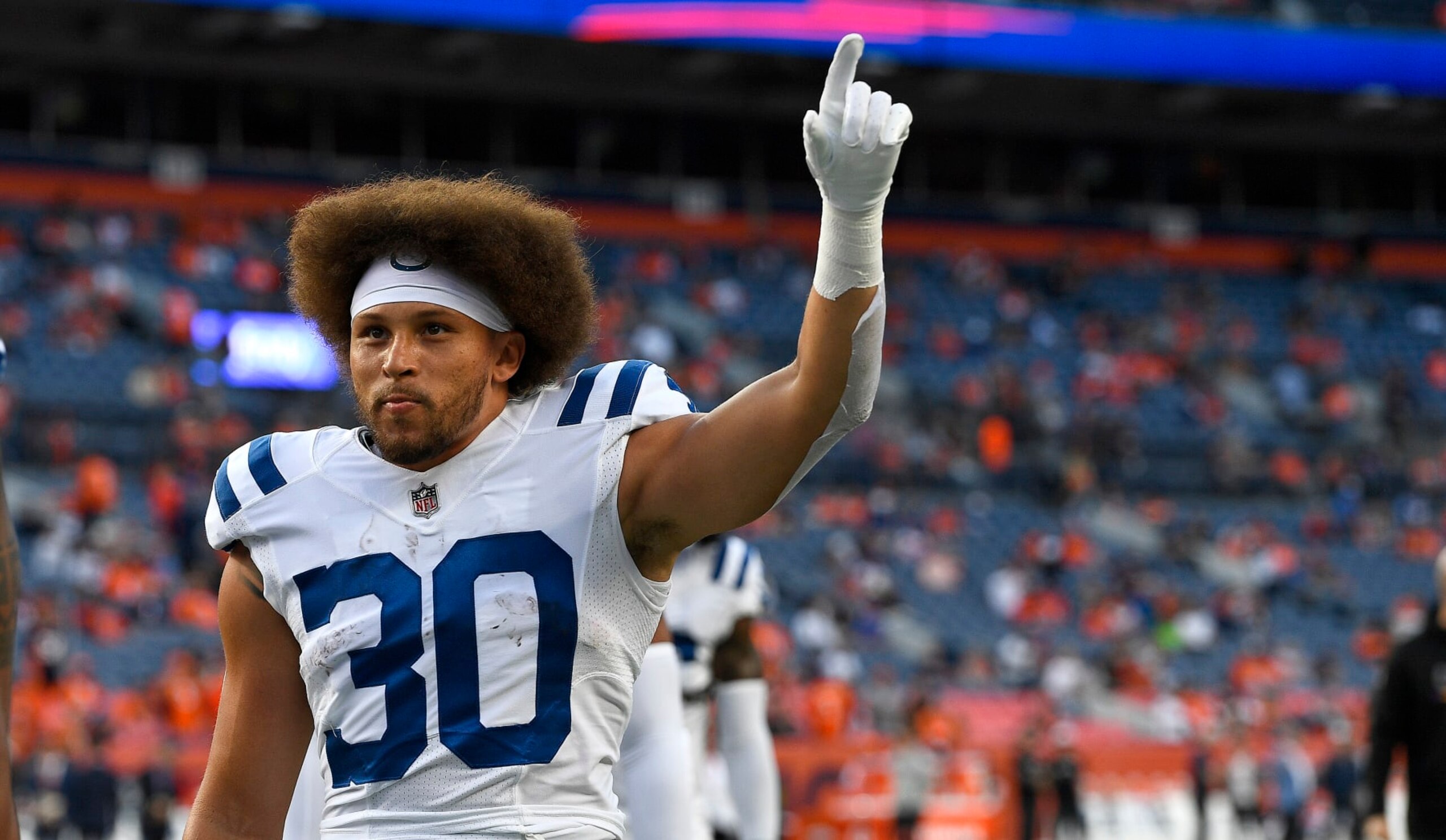 DENVER, COLORADO - OCTOBER 06: Phillip Lindsay #30 of the Indianapolis Colts looks on during a game against the Denver Broncos at Empower Field At Mile High on October 06, 2022 in Denver, Colorado. (Photo by Dustin Bradford/Getty Images) DENVER, COLORADO - OCTOBER 06: Phillip Lindsay #30 of the Indianapolis Colts looks on during a game against the Denver Broncos at Empower Field At Mile High on October 06, 2022 in Denver, Colorado. (Photo by Dustin Bradford/Getty Images)