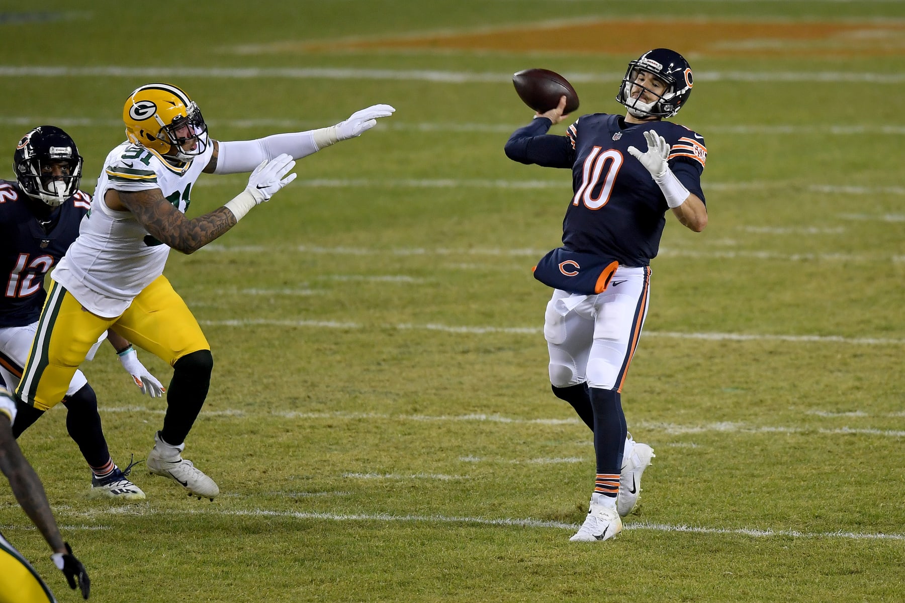 CHICAGO, ILLINOIS - JANUARY 03: Mitchell Trubisky #10 of the Chicago Bears throws a pass against the Green Bay Packers during the third quarter in the game at Soldier Field on January 03, 2021 in Chicago, Illinois. (Photo by Quinn Harris/Getty Images)