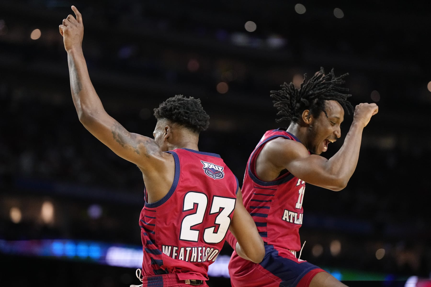 Florida Atlantic guard Brandon Weatherspoon, left, and guard Michael Forrest celebrate after scoring against San Diego State during the first half of a Final Four college basketball game in the NCAA Tournament on Saturday, April 1, 2023, in Houston. (AP Photo/Brynn Anderson)