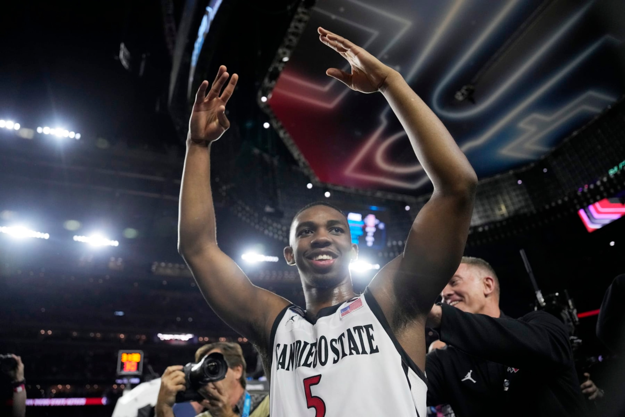 San Diego State guard Lamont Butler celebrates after scoring the game winning basket in a Final Four college basketball game against Florida Atlantic in the NCAA Tournament on Saturday, April 1, 2023, in Houston. (AP Photo/David J. Phillip) San Diego State guard Lamont Butler celebrates after scoring the game winning basket in a Final Four college basketball game against Florida Atlantic in the NCAA Tournament on Saturday, April 1, 2023, in Houston. (AP Photo/David J. Phillip)