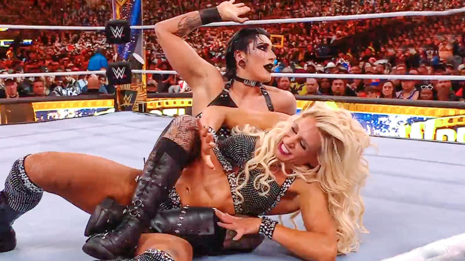 Rhea Ripley and Charlotte Flair.