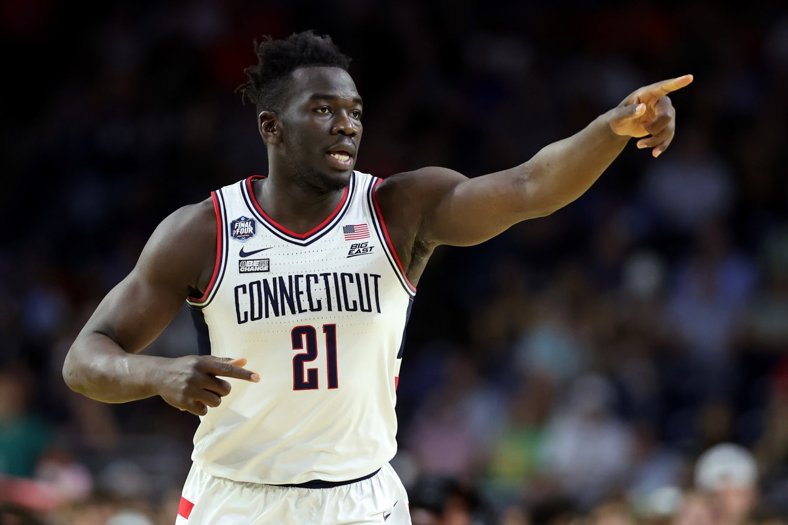 HOUSTON, TEXAS - APRIL 01: Adama Sanogo #21 of the Connecticut Huskies reacts during the first half against the Miami Hurricanes during the NCAA Men's Basketball Tournament Final Four semifinal game at NRG Stadium on April 01, 2023 in Houston, Texas. (Photo by Gregory Shamus/Getty Images)