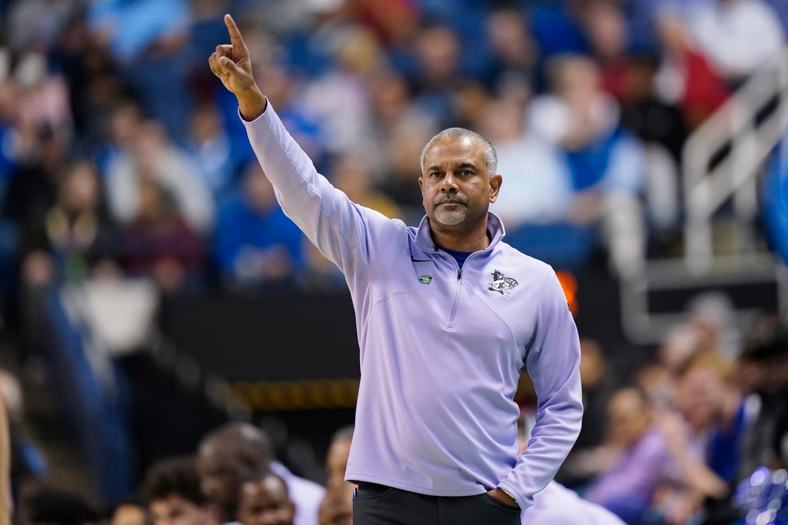 GREENSBORO, NORTH CAROLINA - MARCH 19: Head coach Jerome Tang of the Kansas State Wildcats reacts during the first half against the Kentucky Wildcats in the second round of the NCAA Men's Basketball Tournament at The Fieldhouse at Greensboro Coliseum on March 19, 2023 in Greensboro, North Carolina. (Photo by Jacob Kupferman/Getty Images)