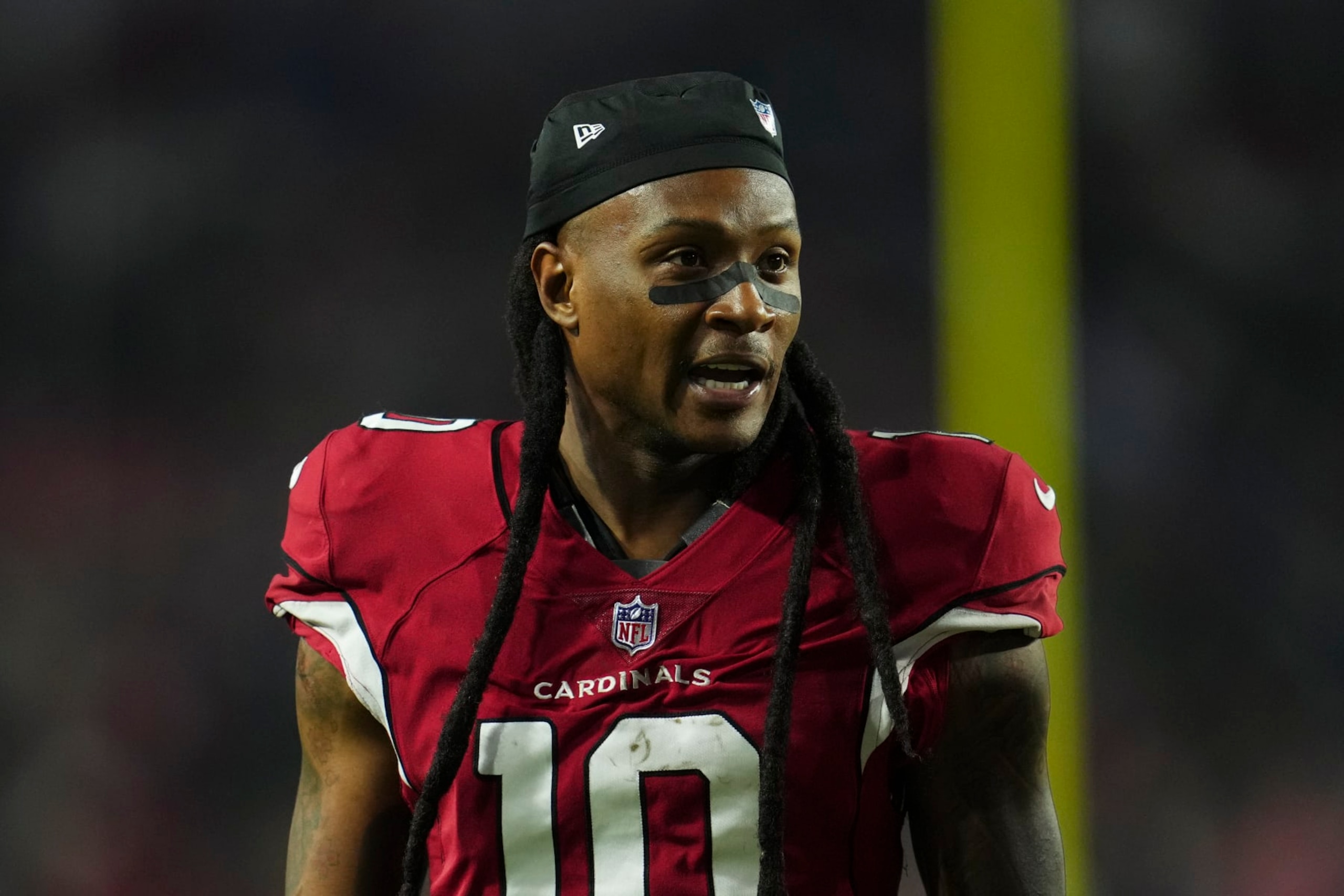 GLENDALE, AZ - DECEMBER 12: DeAndre Hopkins #10 of the Arizona Cardinals runs off of the field against the New England Patriots at State Farm Stadium on December 12, 2022 in Glendale, Arizona. (Photo by Cooper Neill/Getty Images)