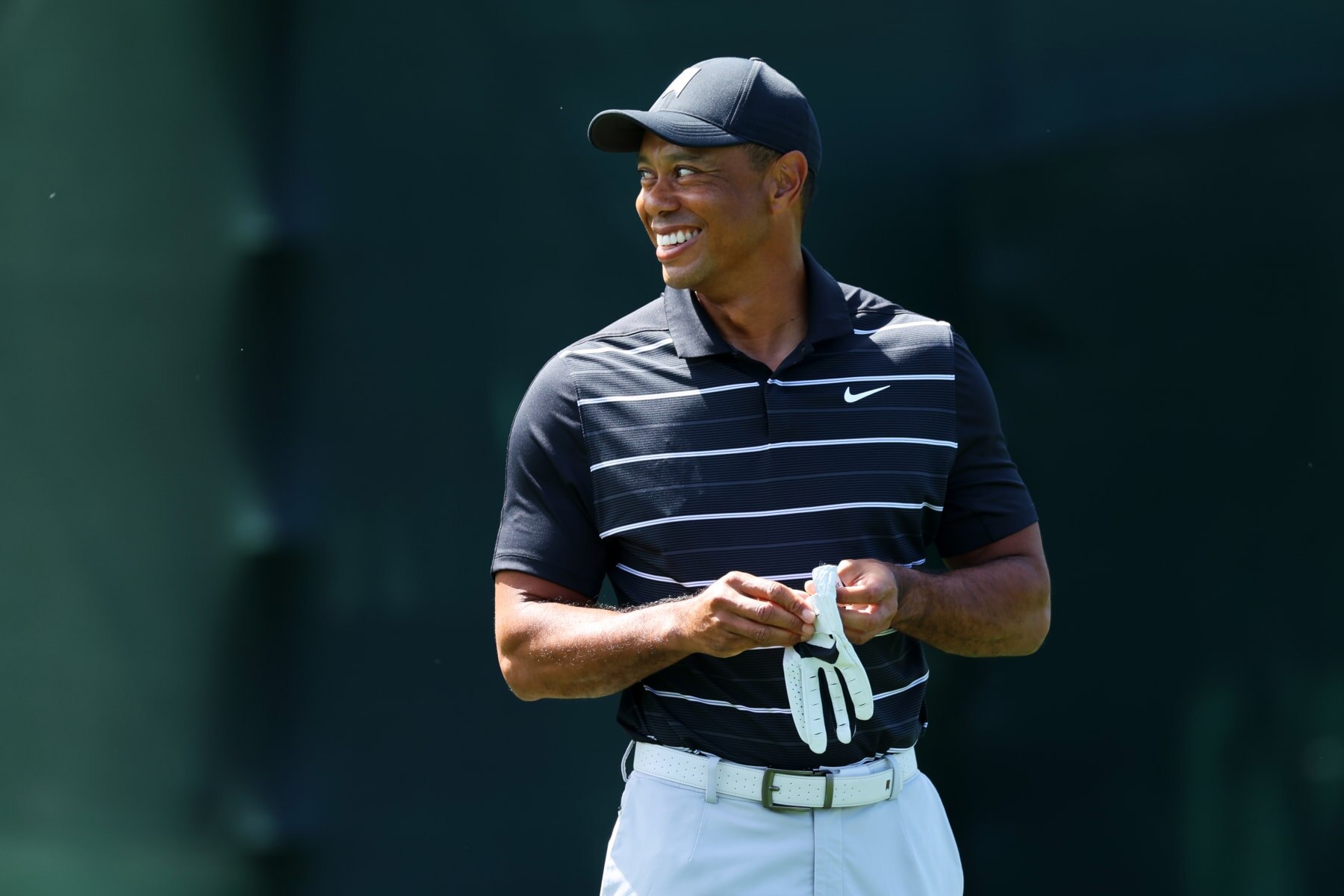 AUGUSTA, GEORGIA - APRIL 02:  Tiger Woods of the United States looks on from the practice area prior to the 2023 Masters Tournament at Augusta National Golf Club on April 02, 2023 in Augusta, Georgia. (Photo by Andrew Redington/Getty Images)