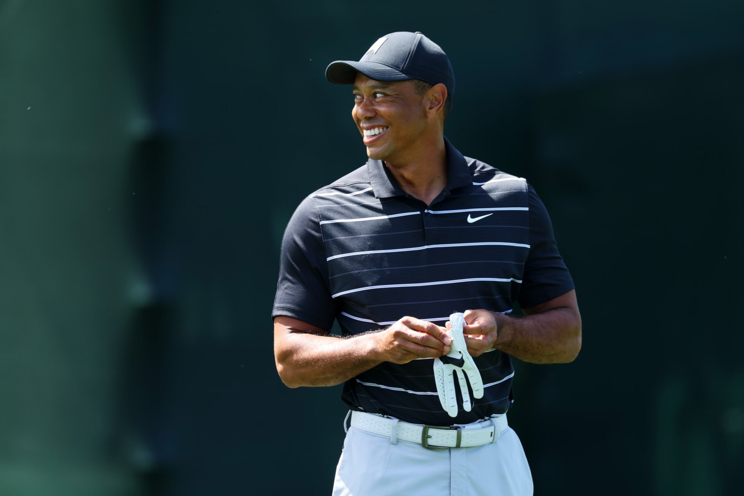 AUGUSTA, GEORGIA - APRIL 02:  Tiger Woods of the United States looks on from the practice area prior to the 2023 Masters Tournament at Augusta National Golf Club on April 02, 2023 in Augusta, Georgia. (Photo by Andrew Redington/Getty Images)