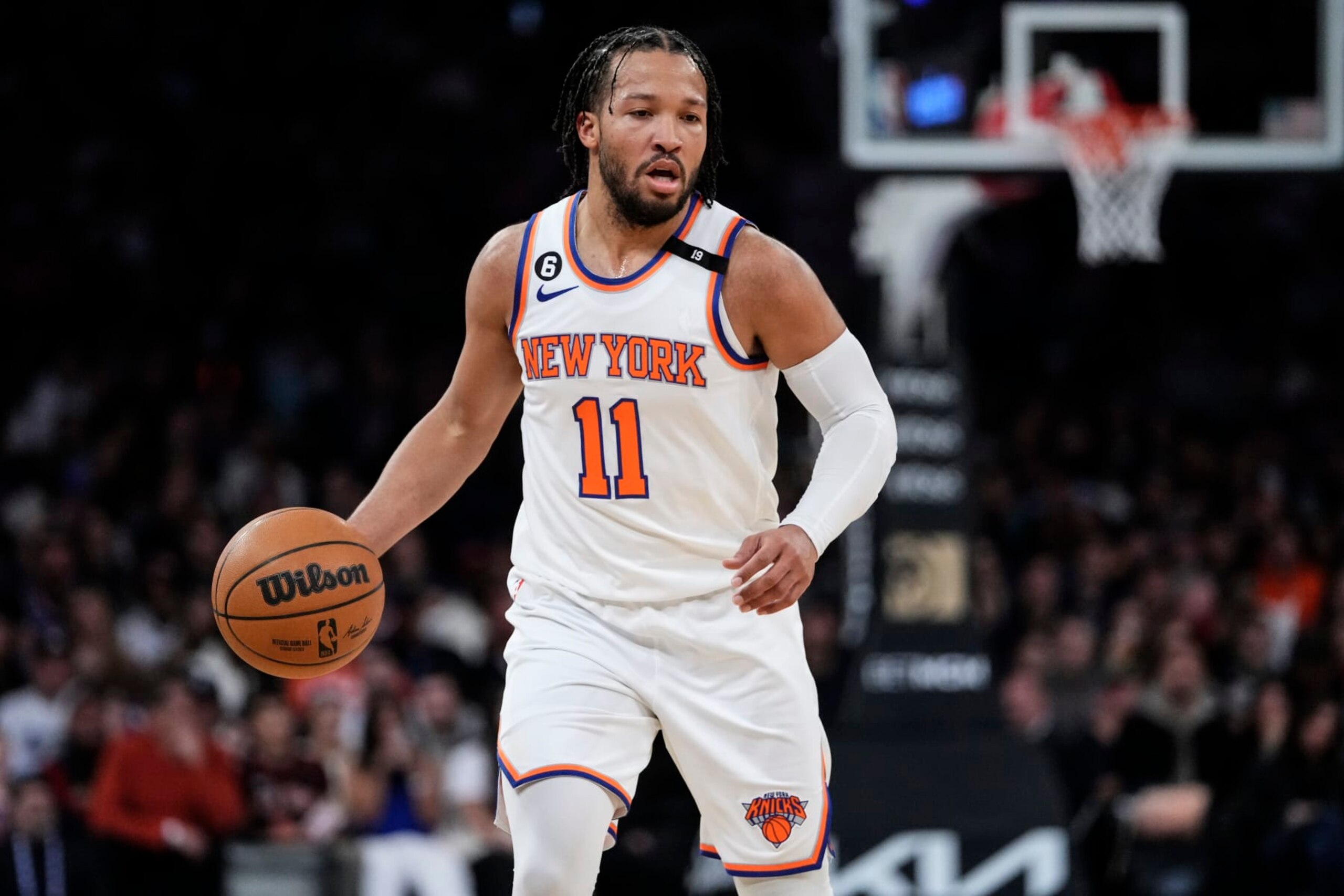 New York Knicks' Jalen Brunson (11) looks to pass during the first half of an NBA basketball game against the Washington Wizards Sunday, April 2, 2023, in New York. (AP Photo/Frank Franklin II)