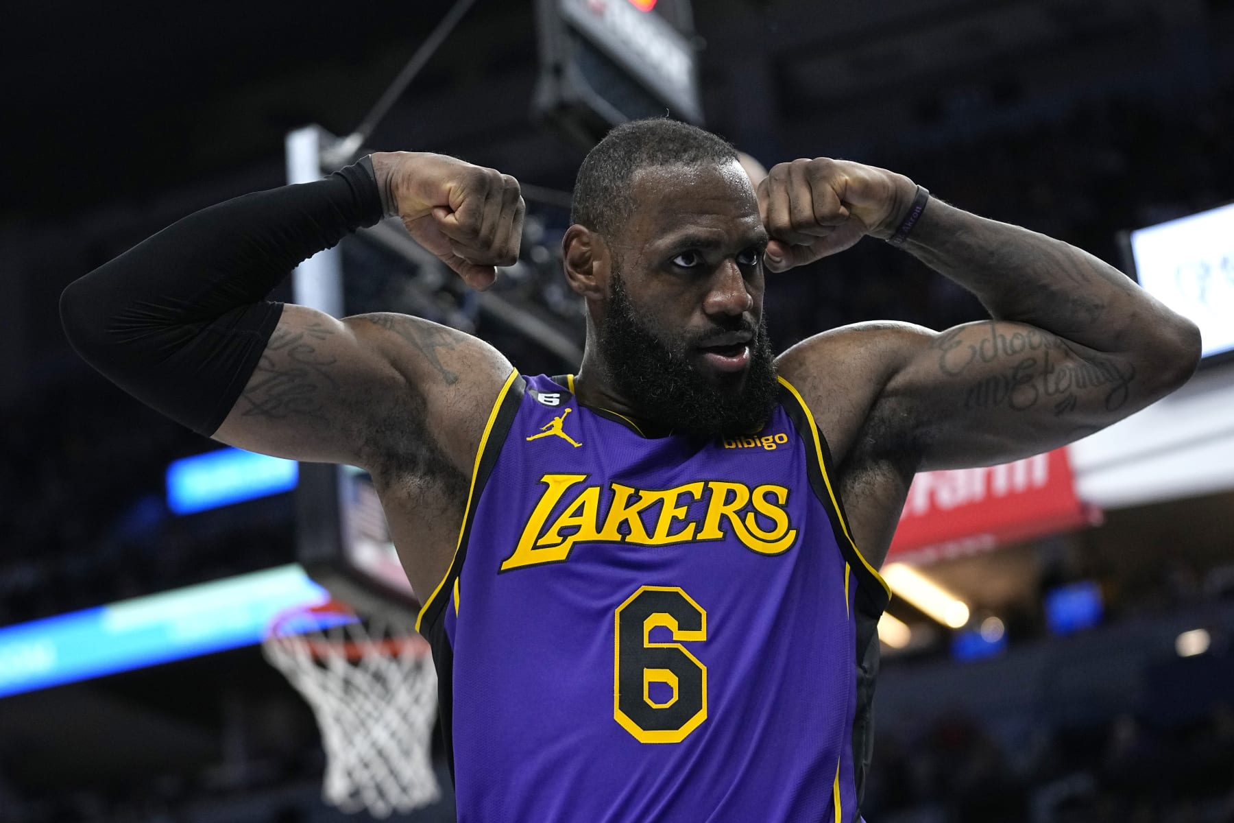 Los Angeles Lakers forward LeBron James (6) celebrates after making a basket while fouled during the second half of an NBA basketball game against the Minnesota Timberwolves, Friday, March 31, 2023, in Minneapolis. (AP Photo/Abbie Parr)