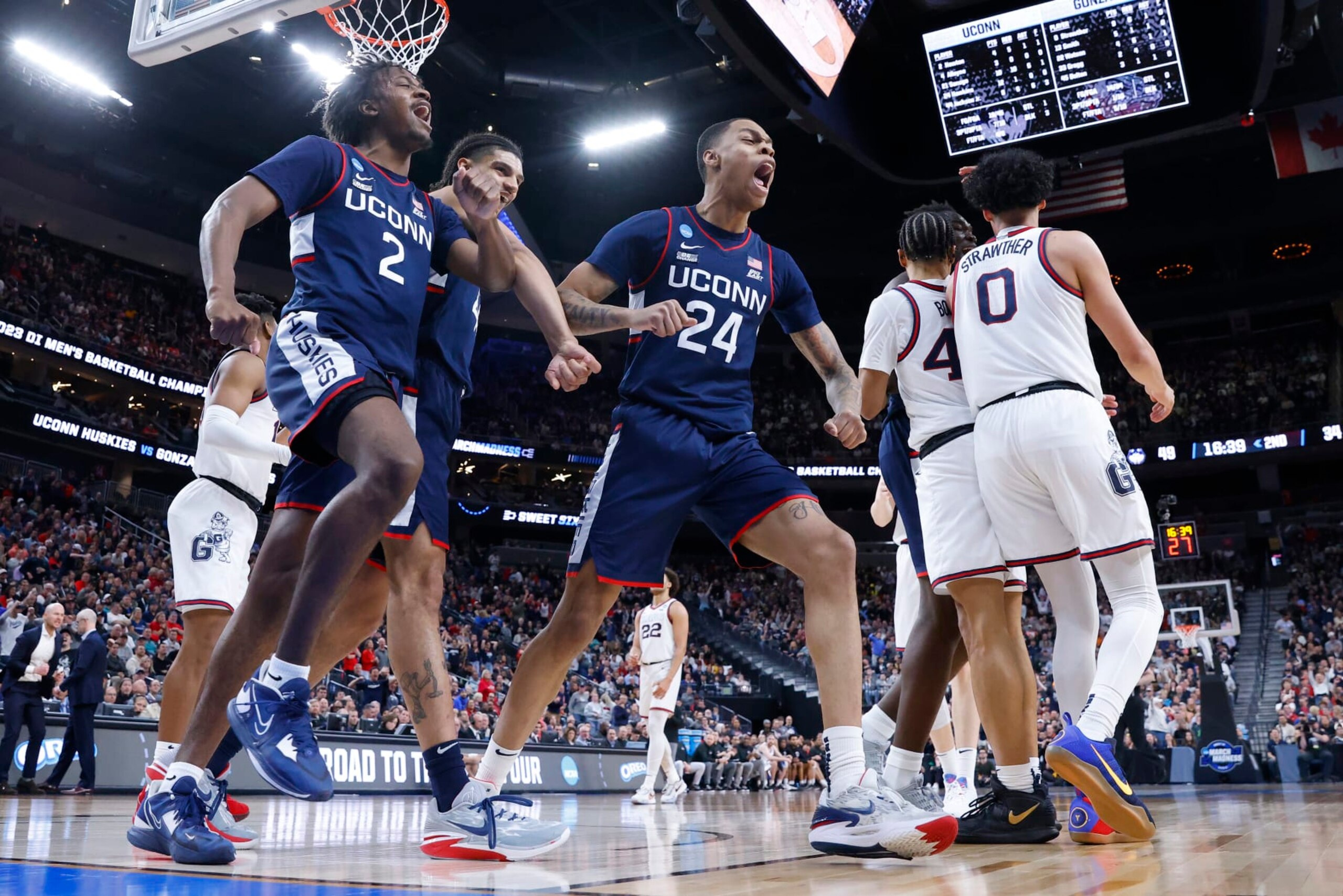 LAS VEGAS, NEVADA - MARCH 25: Jordan Hawkins #24 of the Connecticut Huskies celebrates after a made basket during the second half against the Gonzaga Bulldogs in the Elite Eight round of the NCAA Men's Basketball Tournament at T-Mobile Arena on March 25, 2023 in Las Vegas, Nevada. (Photo by Sean M. Haffey/Getty Images)