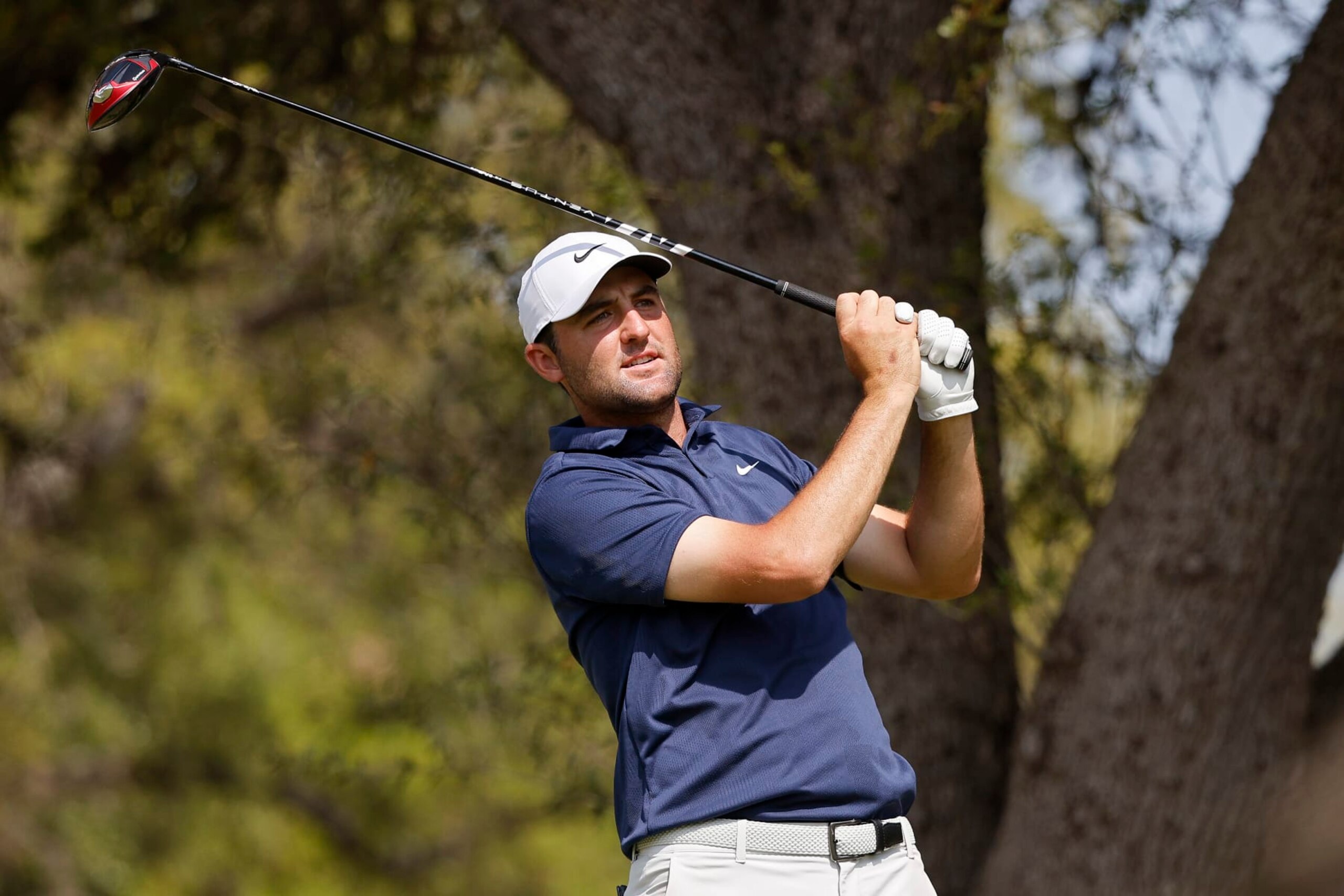 AUSTIN, TEXAS - MARCH 26: Scottie Scheffler of the United States plays his shot from the eighth tee during day five of the World Golf Championships-Dell Technologies Match Play at Austin Country Club on March 26, 2023 in Austin, Texas. (Photo by Mike Mulholland/Getty Images)
