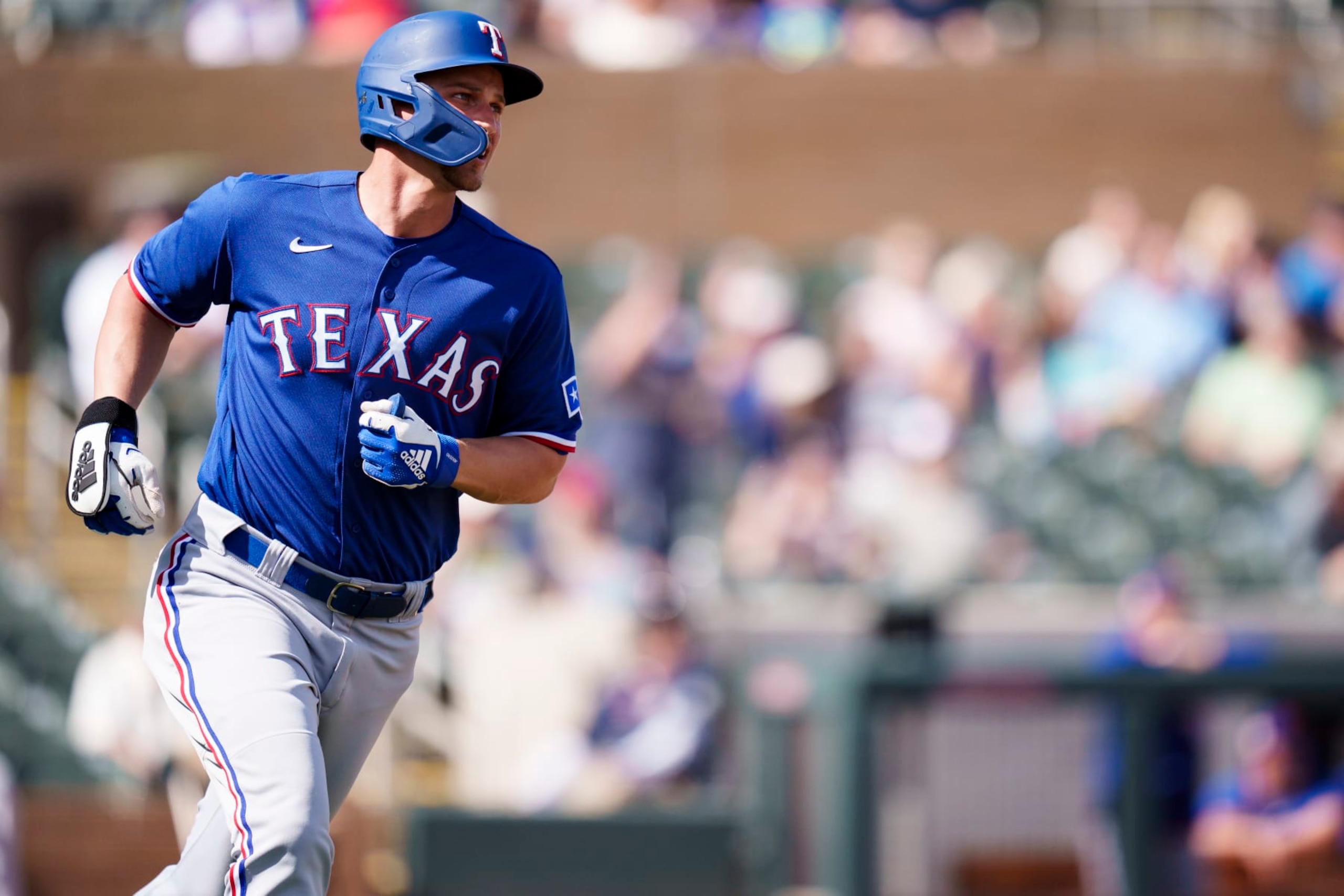 SCOTTSDALE, AZ - MARCH 06: Corey Seager #5 of the Texas Rangers runs after hitting a home run during a spring training game against the Colorado Rockies at Salt River Fields at Talking Stick on March 6, 2023 in Scottsdale, Arizona. (Photo by Ben Ludeman/Texas Rangers/Getty Images)