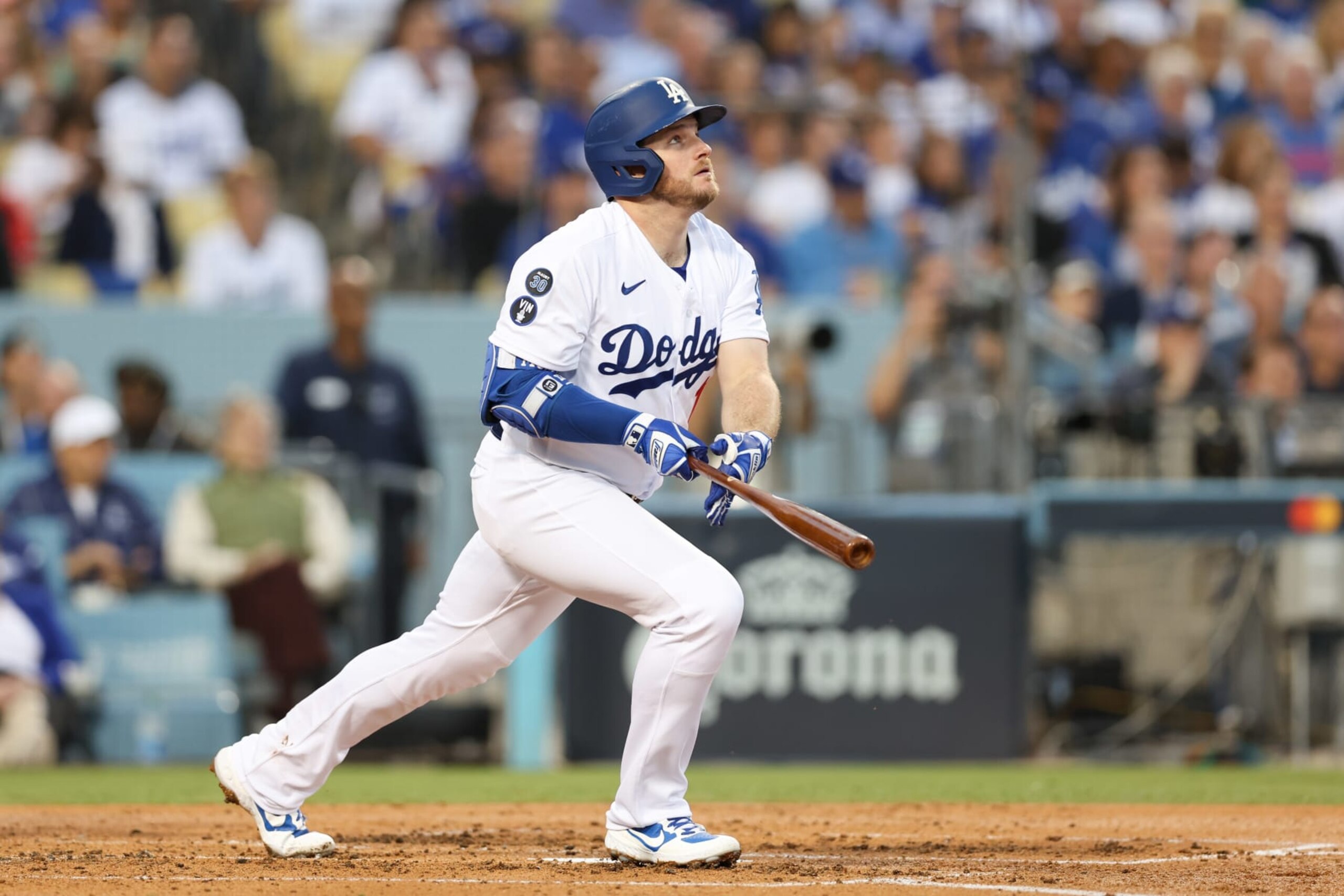 LOS ANGELES, CA - OCTOBER 12:   Max Muncy #13 of the Los Angeles Dodgers hits a home run in the second inning during the game between the San Diego Padres and the Los Angeles Dodgers at Dodgers Stadium on Wednesday, October 12, 2022 in Los Angeles, California. (Photo by Rob Leiter/MLB Photos via Getty Images)