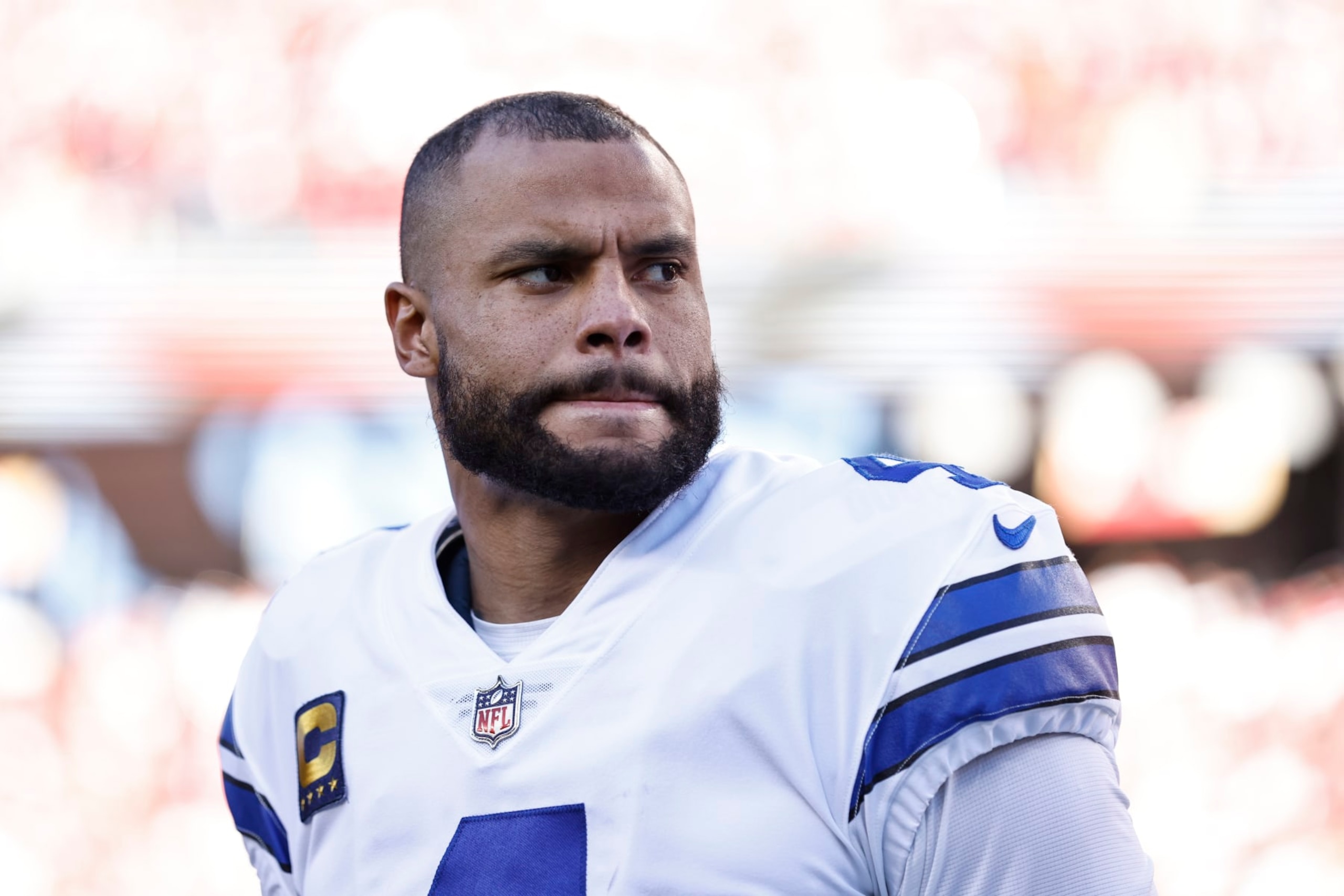 SANTA CLARA, CALIFORNIA - JANUARY 22: Dak Prescott #4 of the Dallas Cowboys looks on during the national anthem prior to an NFL divisional round playoff football game between the San Francisco 49ers and the Dallas Cowboys at Levi's Stadium on January 22, 2023 in Santa Clara, California. (Photo by Michael Owens/Getty Images)