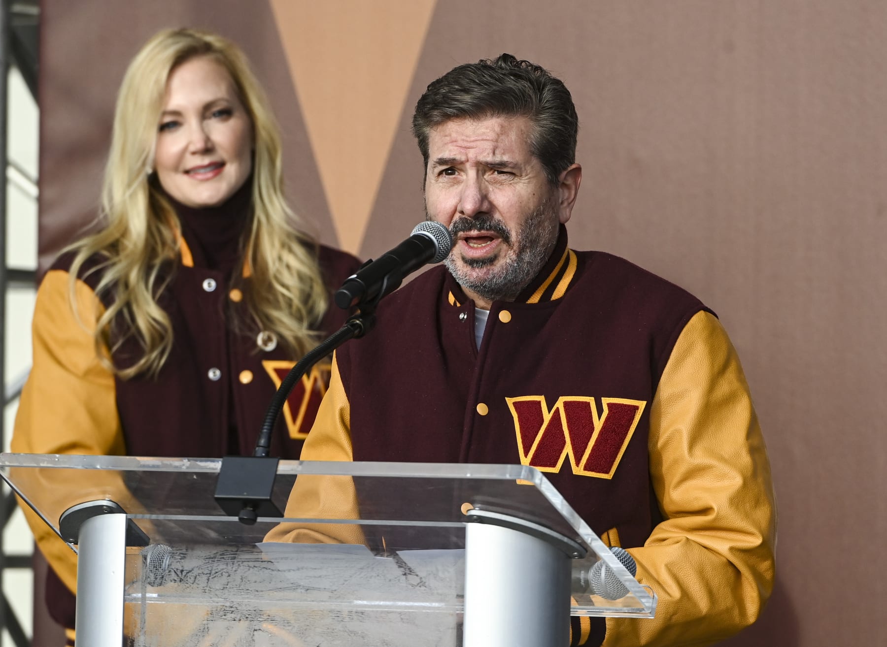 LANDOVER, MD - FEBRUARY 2:  Washington Commanders co-CEOs and co-owners Dan and Tanya Snyder, make remarks during the team name reveal event at FedEx Field.  (Photo by Jonathan Newton/The Washington Post via Getty Images)