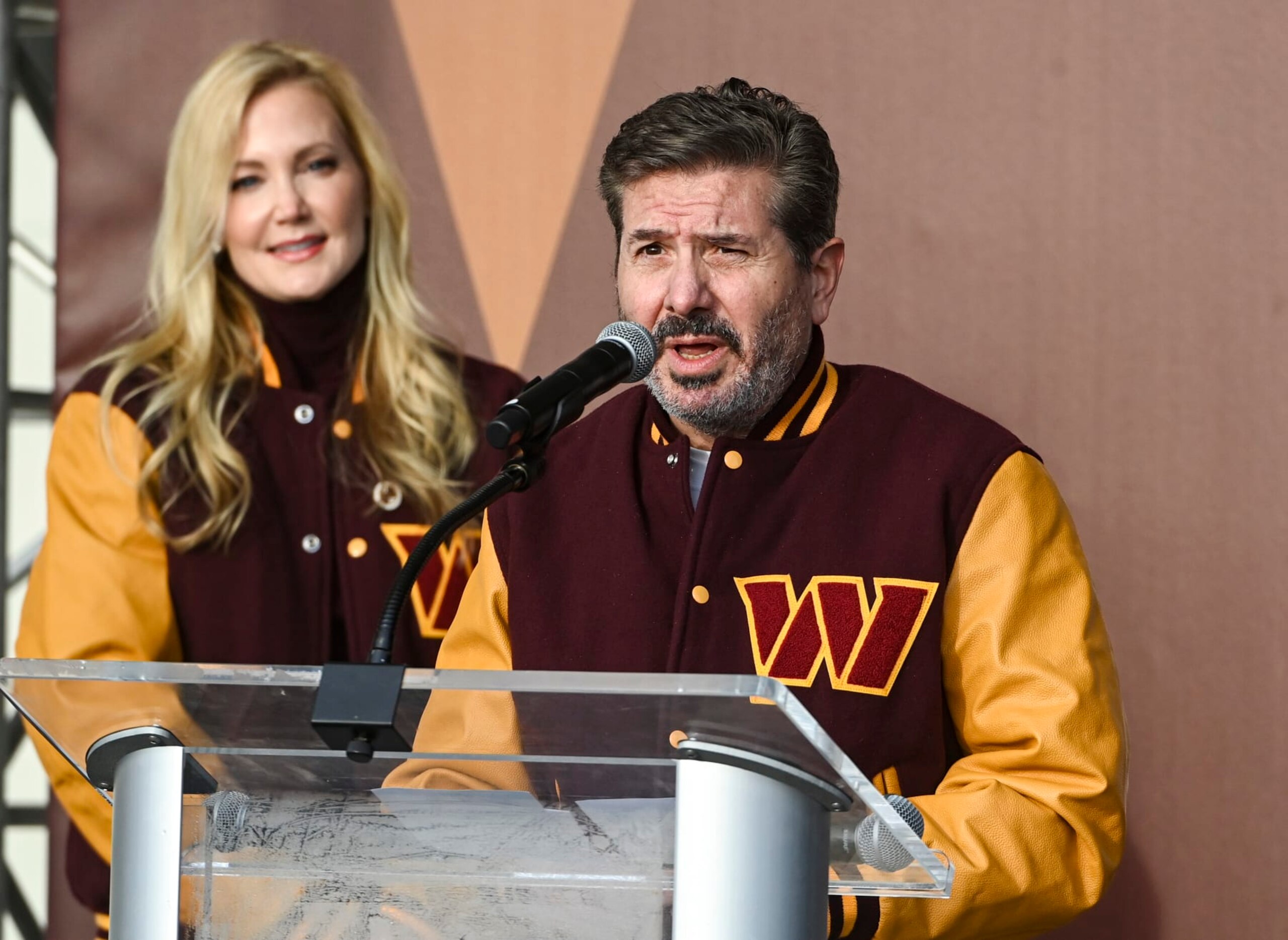 LANDOVER, MD - FEBRUARY 2:  Washington Commanders co-CEOs and co-owners Dan and Tanya Snyder, make remarks during the team name reveal event at FedEx Field.  (Photo by Jonathan Newton/The Washington Post via Getty Images)