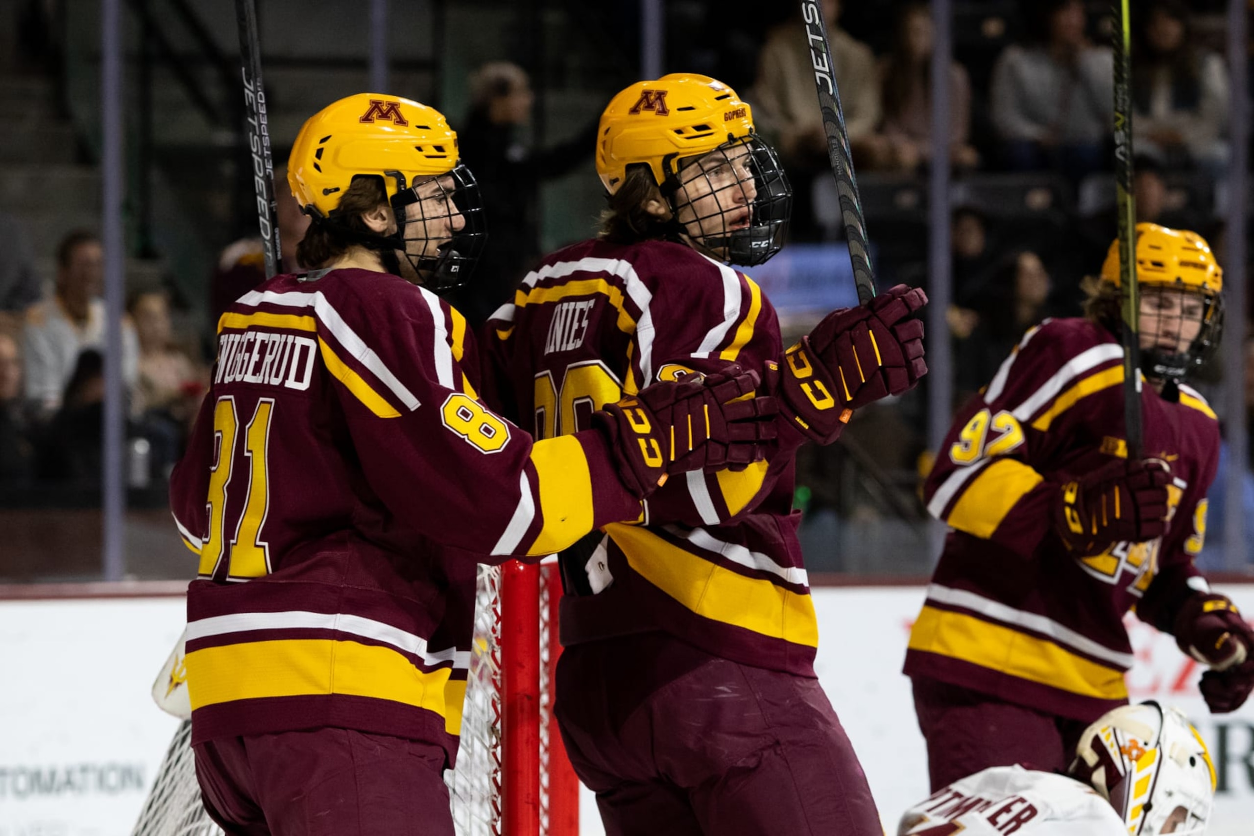 TEMPE, AZ - NOVEMBER 26: University of Minnesota Forward Matthew Knies (89) celebrates a goal with University of Minnesota Forward Jimmy Snuggerud (81) during a College Hockey game between the Minnesota Golden Gophers and the Arizona State Sun Devils on November 26th, 2022, at Mullett Arena in Tempe, AZ. (Photo by Zac BonDurant/Icon Sportswire via Getty Images)