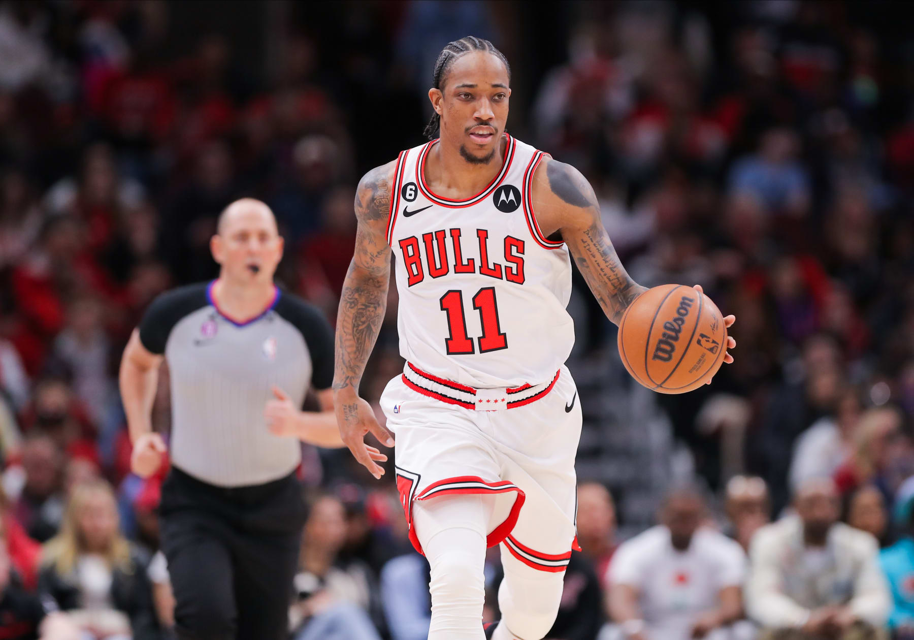 CHICAGO, IL - APRIL 02: Chicago Bulls forward DeMar DeRozan (11) brings the ball up court during a NBA game between the Memphis Grizzlies and the Chicago Bulls on April 2, 2023 at the United Center in Chicago, IL. (Photo by Melissa Tamez/Icon Sportswire via Getty Images)