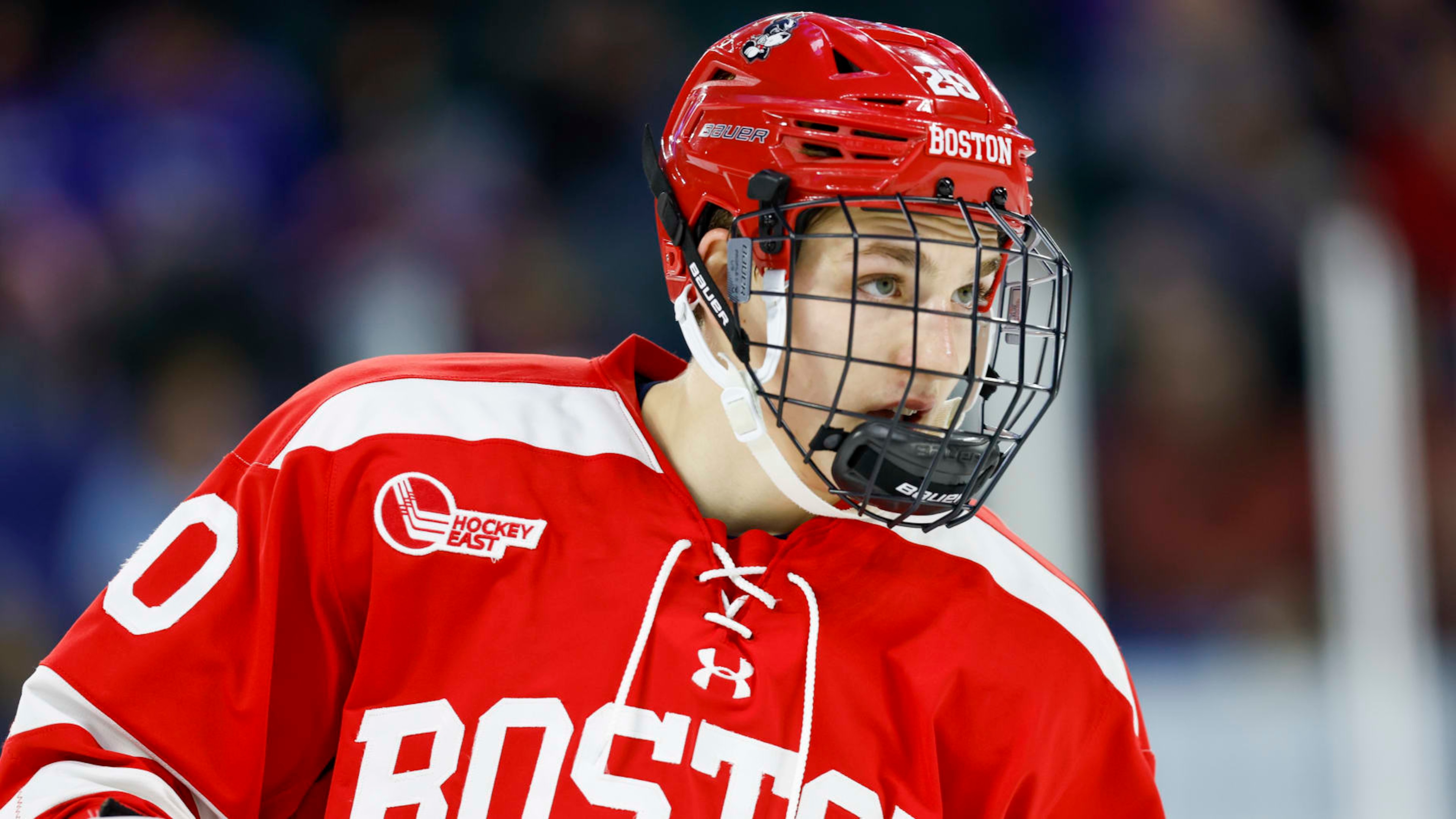 Boston University defenseman Lane Hutson (20) skates during the second period of an NCAA hockey game against UMass Lowell on Friday, Oct. 28, 2022, in Lowell, Mass. (AP Photo/Greg M. Cooper)