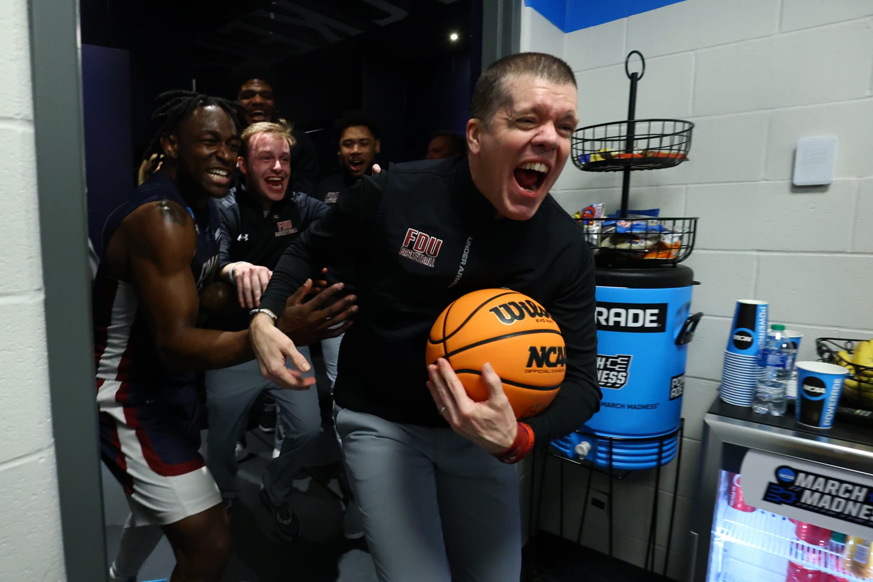 COLUMBUS, OH - MARCH 17: Tobin Anderson head coach of the Fairleigh Dickinson Knights celebrates their win over the Purdue Boilermakers during the first round of the 2023 NCAA Men's Basketball Tournament held at Nationwide Arena on March 17, 2023 in Columbus, Ohio. (Photo by Tyler Schank/NCAA Photos via Getty Images)