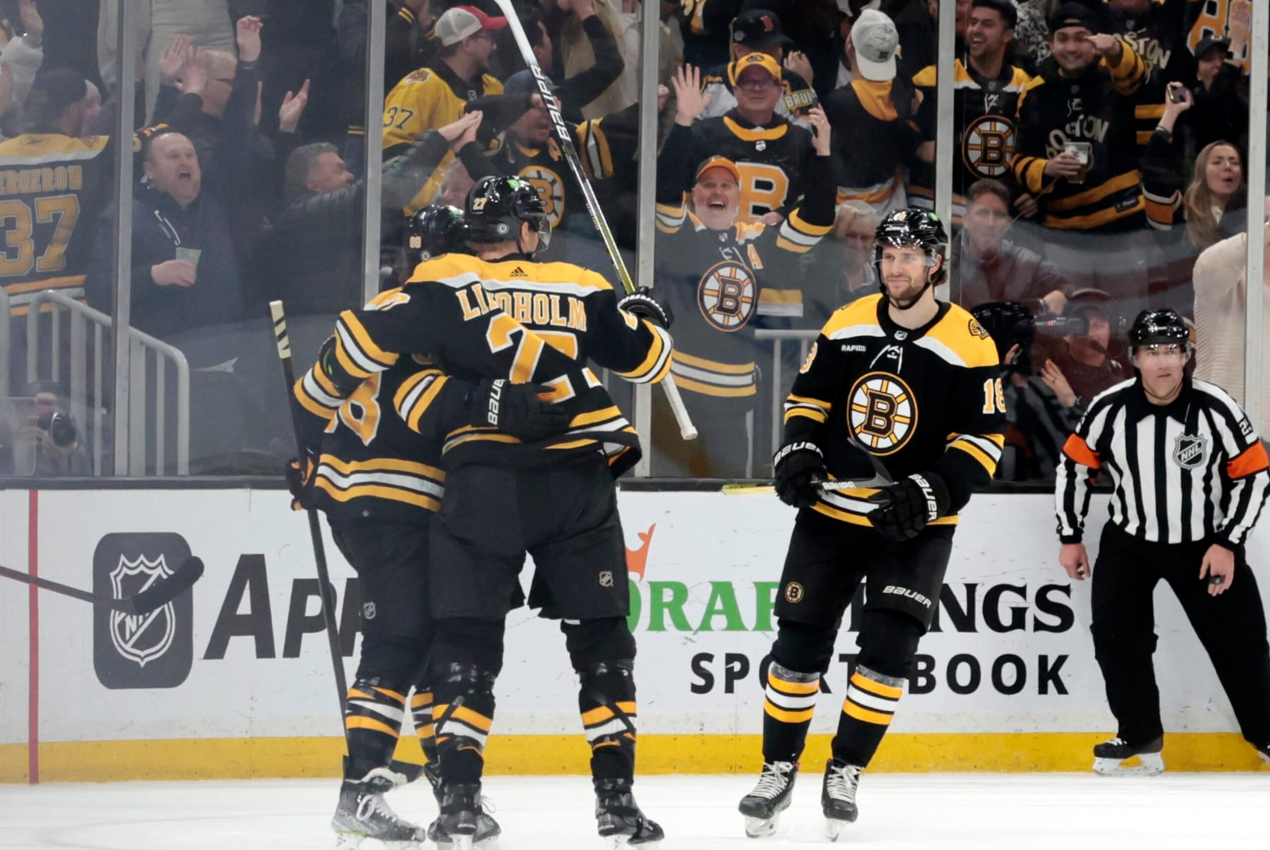 BOSTON, MA - MARCH 30: Boston celebrates an overtime winner from Boston Bruins right wing David Pastrnak (88) during a game between the Boston Bruins and the Columbus Blue Jackets on March 30, 2023, at TD Garden in Boston, Massachusetts. (Photo by Fred Kfoury III/Icon Sportswire via Getty Images)