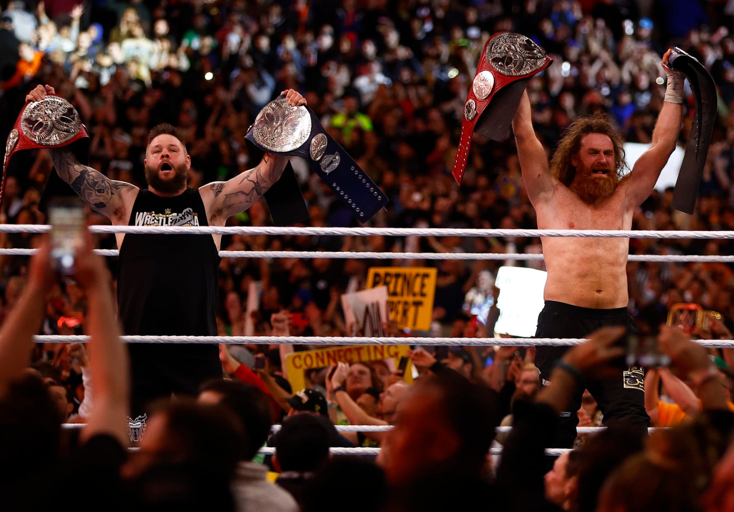 INGLEWOOD, CALIFORNIA - APRIL 01: Kevin Owens and Sami Zayn after defeating The Usos for the Undisputed WWE tag team championship during WrestleMania Goes Hollywood at SoFi Stadium on April 01, 2023 in Inglewood, California. (Photo by Ronald Martinez/Getty Images)