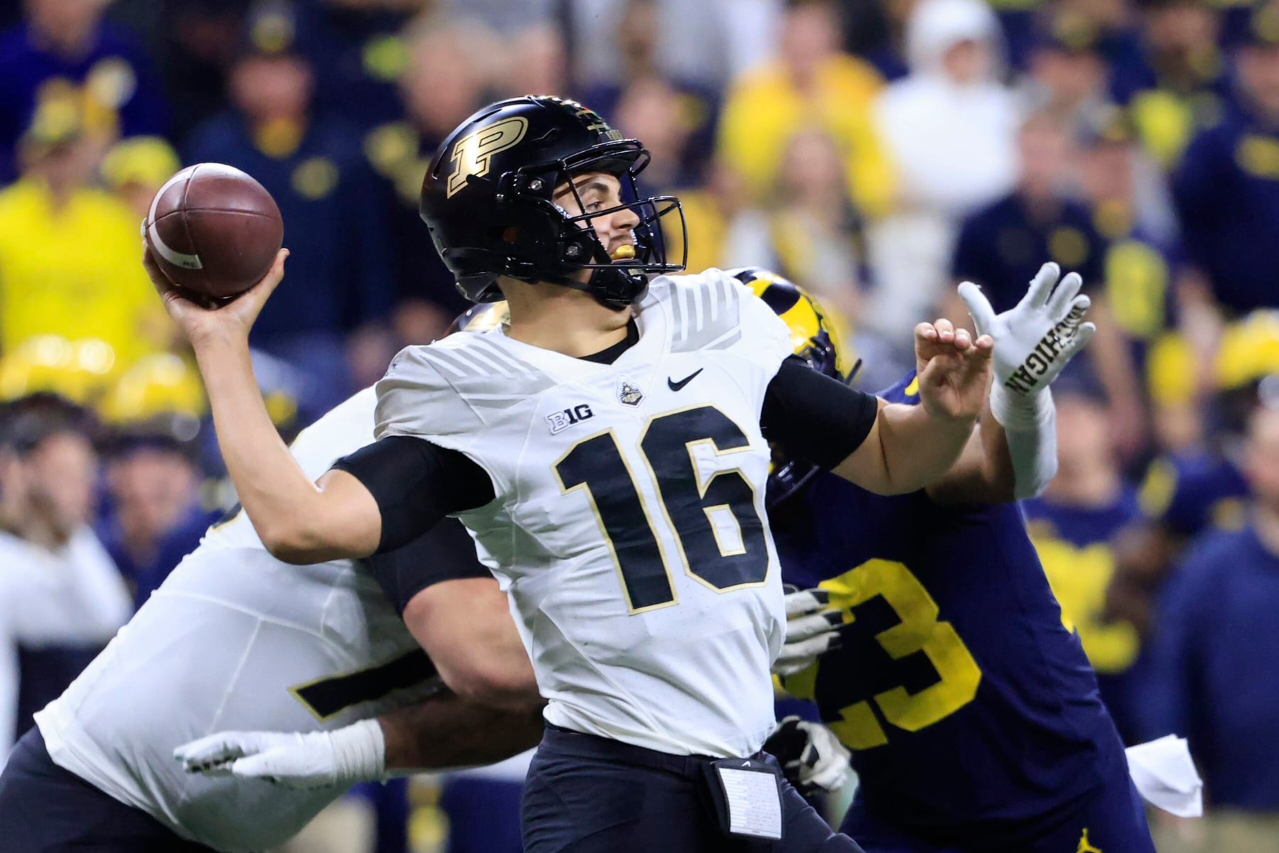 INDIANAPOLIS, INDIANA - DECEMBER 03: Aidan O'Connell #16 of the Purdue Boilermakers throws the ball during the second half in the Big Ten Championship against the Michigan Wolverines at Lucas Oil Stadium on December 03, 2022 in Indianapolis, Indiana. (Photo by Justin Casterline/Getty Images)