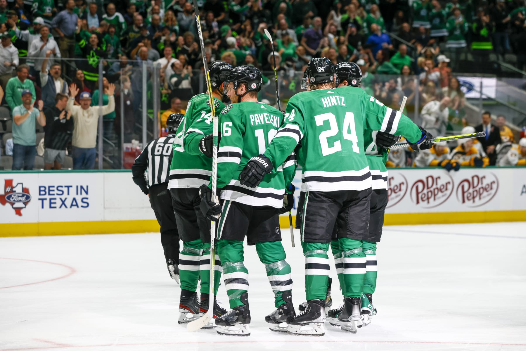 DALLAS, TX - APRIL 03: Dallas Stars center Joe Pavelski (16) celebrates with his teammates after scoring a goal during the game between the Dallas Stars and the Nashville Predators on April 3, 2023 at American Airlines Center in Dallas, Texas. (Photo by Matthew Pearce/Icon Sportswire via Getty Images)