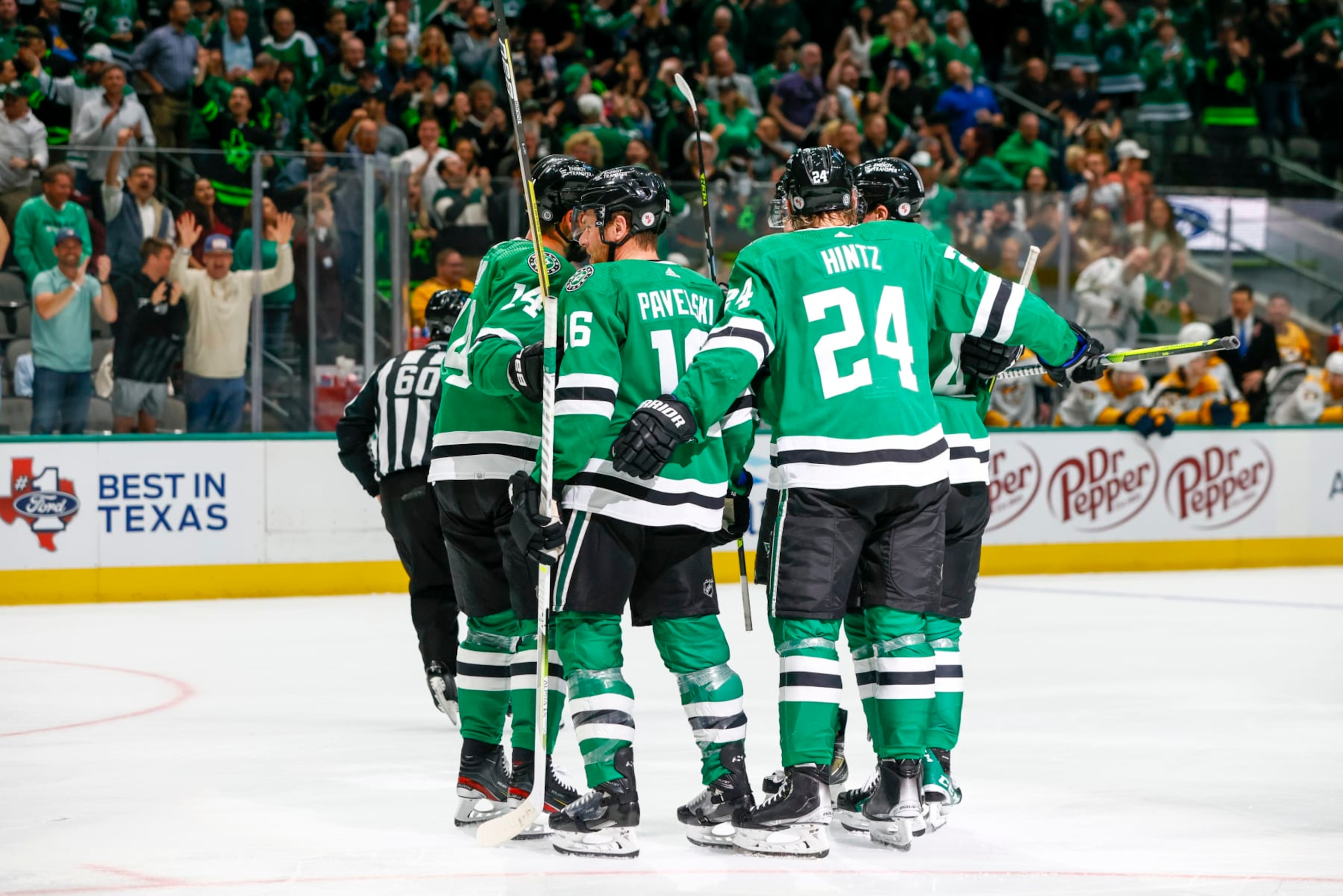DALLAS, TX - APRIL 03: Dallas Stars center Joe Pavelski (16) celebrates with his teammates after scoring a goal during the game between the Dallas Stars and the Nashville Predators on April 3, 2023 at American Airlines Center in Dallas, Texas. (Photo by Matthew Pearce/Icon Sportswire via Getty Images)