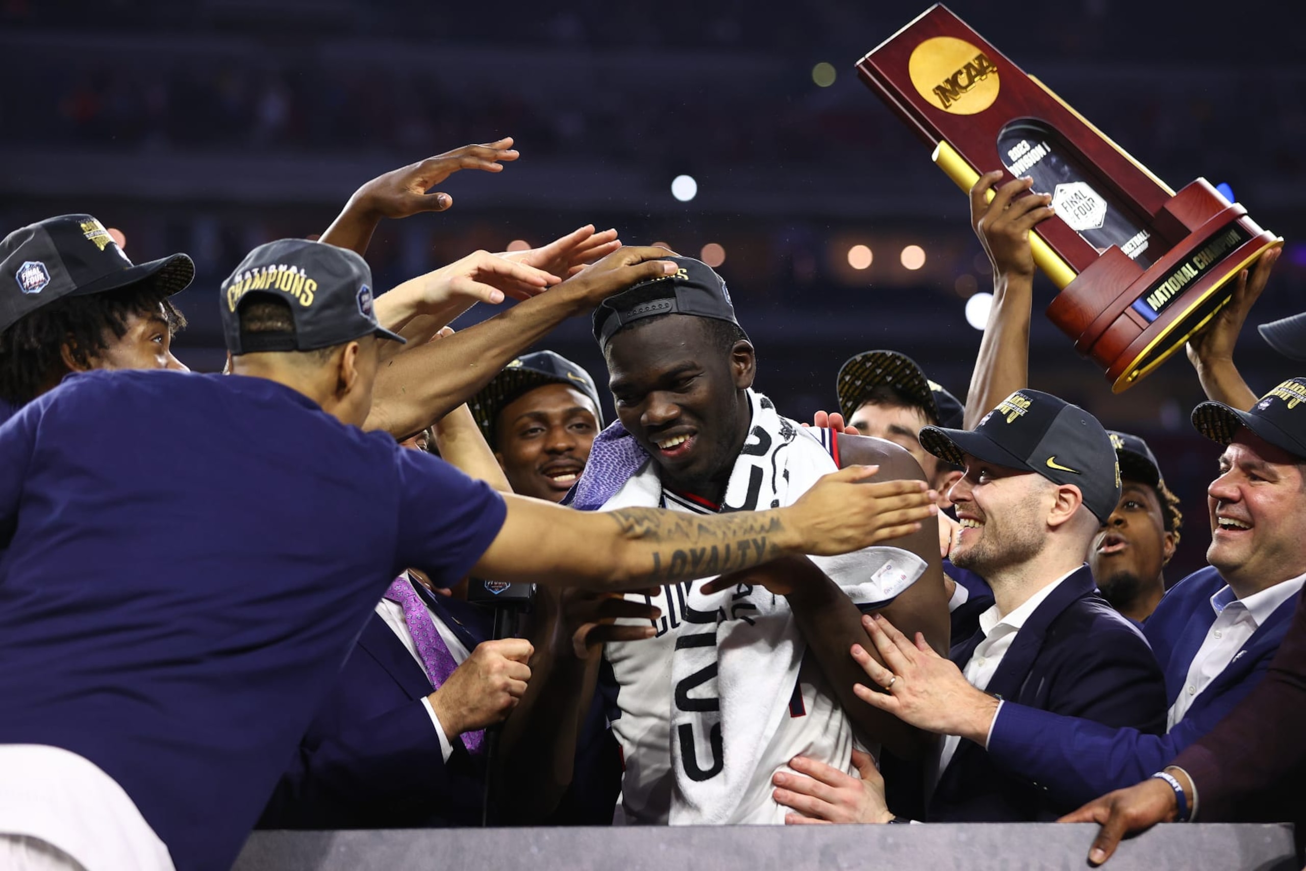 HOUSTON, TEXAS - APRIL 03: Adama Sanogo #21 of the Connecticut Huskies celebrates after defeating the San Diego State Aztecs to win the NCAA Men's Basketball Tournament National Championship at NRG Stadium on April 03, 2023 in Houston, Texas. (Photo by Jamie Schwaberow/NCAA Photos via Getty Images)