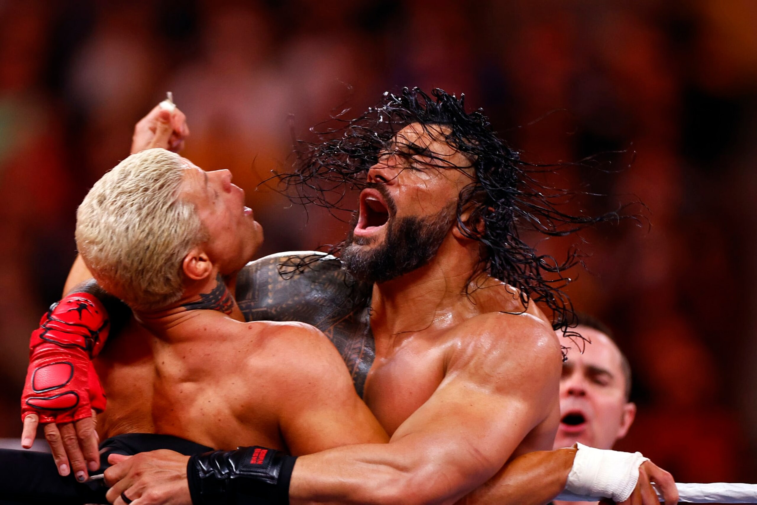 INGLEWOOD, CALIFORNIA - APRIL 02:  (L-R) Cody Rhodes wrestles Roman Reigns for Undisputed WWE Universal Title Match during WrestleMania Goes Hollywood at SoFi Stadium on April 02, 2023 in Inglewood, California.
 (Photo by Ronald Martinez/Getty Images)
