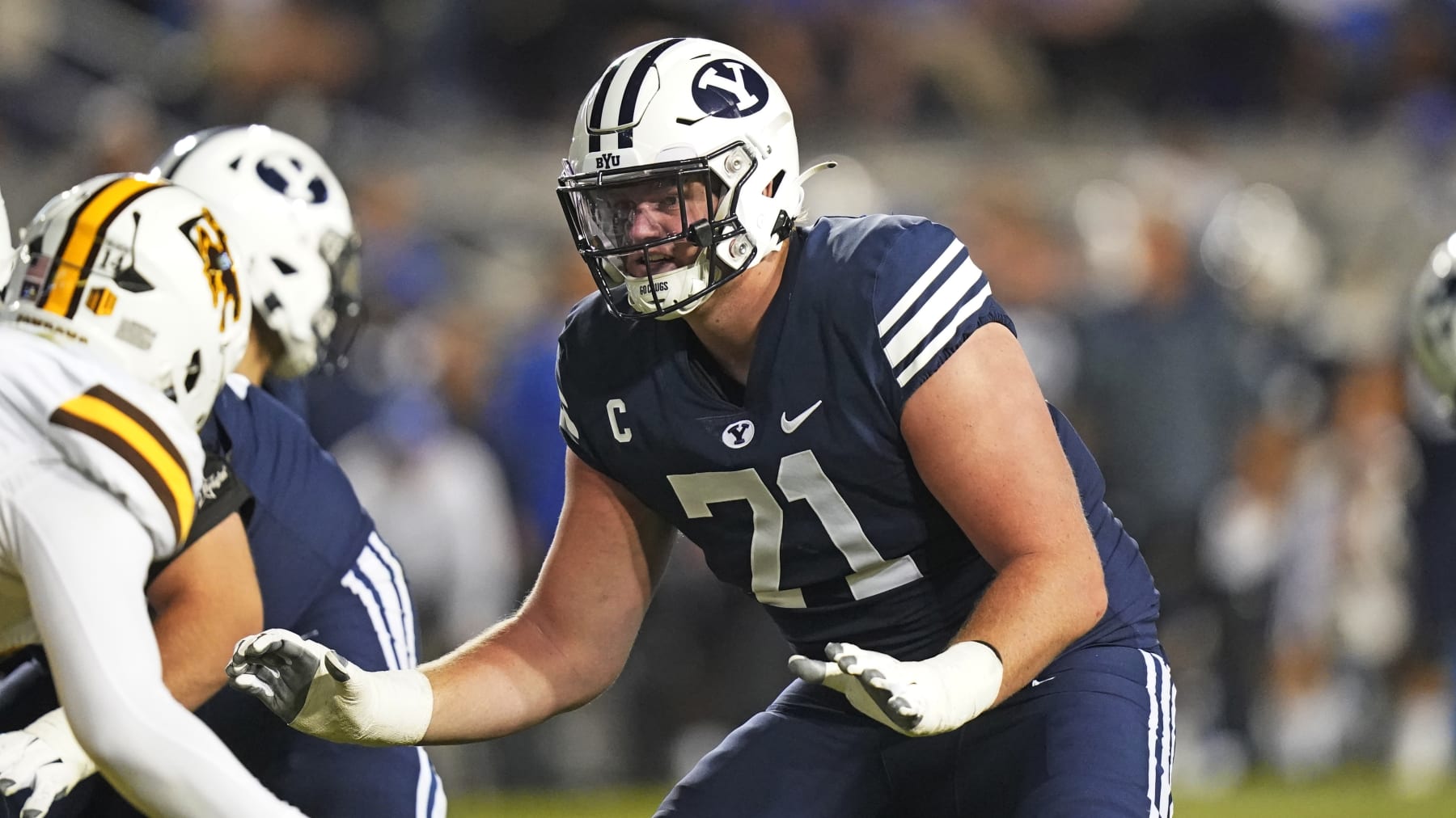BYU offensive lineman Blake Freeland (71) blocks during the second half of an NCAA college football game against Wyoming Saturday, Sept. 24, 2022, in Provo, Utah. (AP Photo/Rick Bowmer) BYU offensive lineman Blake Freeland (71) blocks during the second half of an NCAA college football game against Wyoming Saturday, Sept. 24, 2022, in Provo, Utah. (AP Photo/Rick Bowmer)