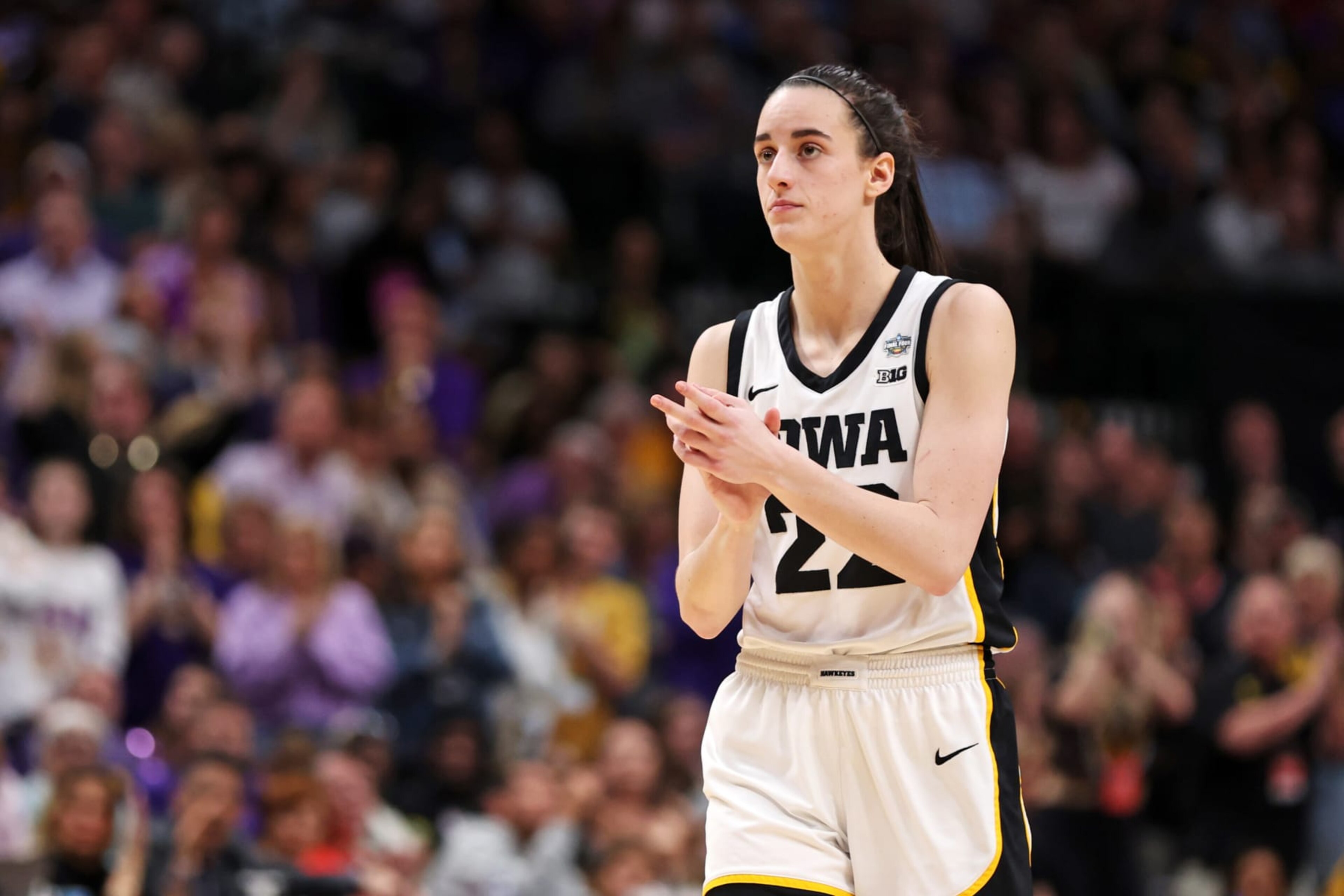 DALLAS, TEXAS - APRIL 02: Caitlin Clark #22 of the Iowa Hawkeyes reacts during the third quarter against the LSU Lady Tigers during the 2023 NCAA Women's Basketball Tournament championship game at American Airlines Center on April 02, 2023 in Dallas, Texas. (Photo by Maddie Meyer/Getty Images) DALLAS, TEXAS - APRIL 02: Caitlin Clark #22 of the Iowa Hawkeyes reacts during the third quarter against the LSU Lady Tigers during the 2023 NCAA Women's Basketball Tournament championship game at American Airlines Center on April 02, 2023 in Dallas, Texas. (Photo by Maddie Meyer/Getty Images)