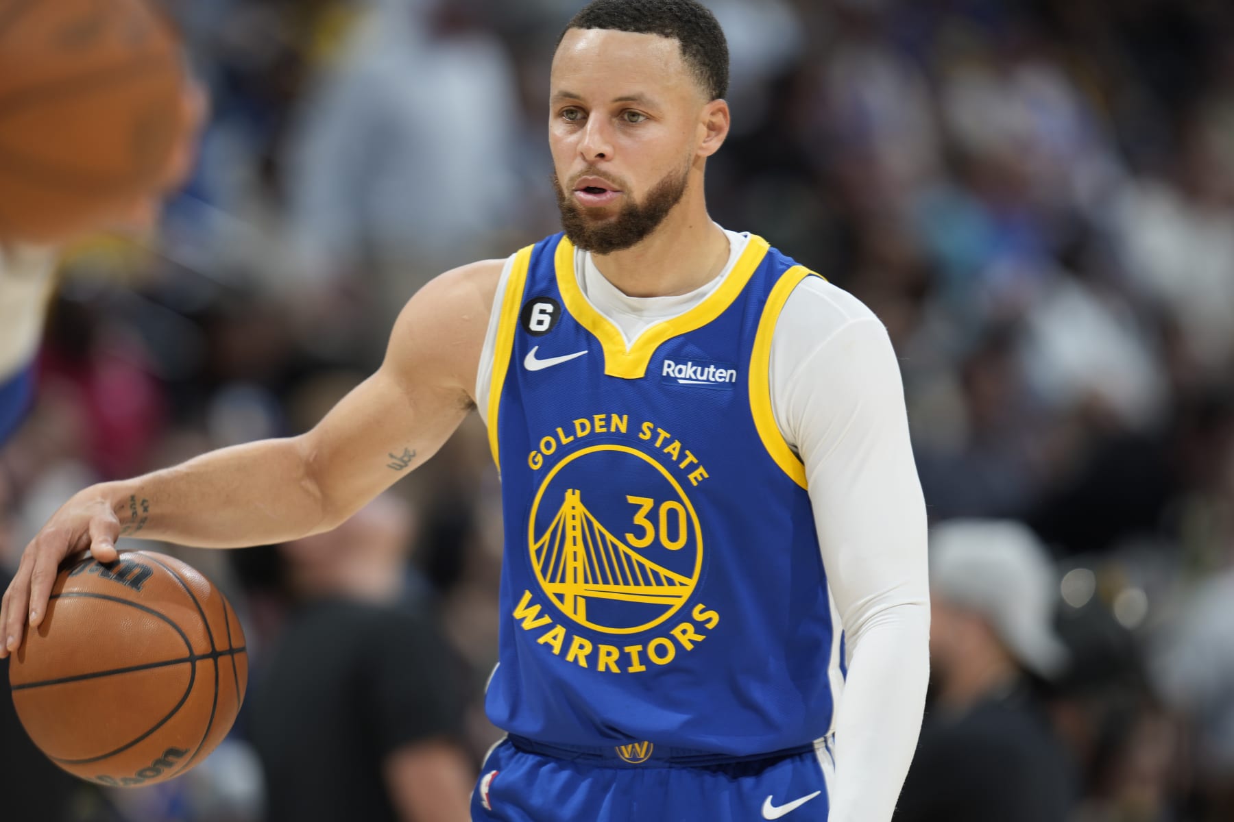 Golden State Warriors guard Stephen Curry (30) in the second half of an NBA basketball game Sunday, April 2, 2023, in Denver. (AP Photo/David Zalubowski)