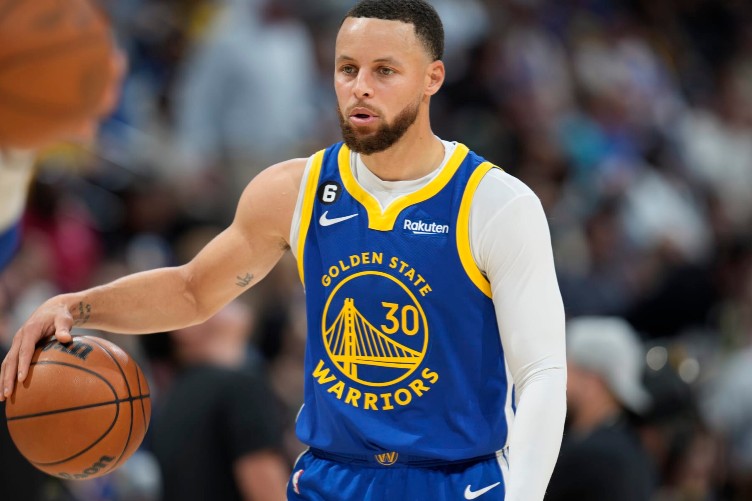 Golden State Warriors guard Stephen Curry (30) in the second half of an NBA basketball game Sunday, April 2, 2023, in Denver. (AP Photo/David Zalubowski)