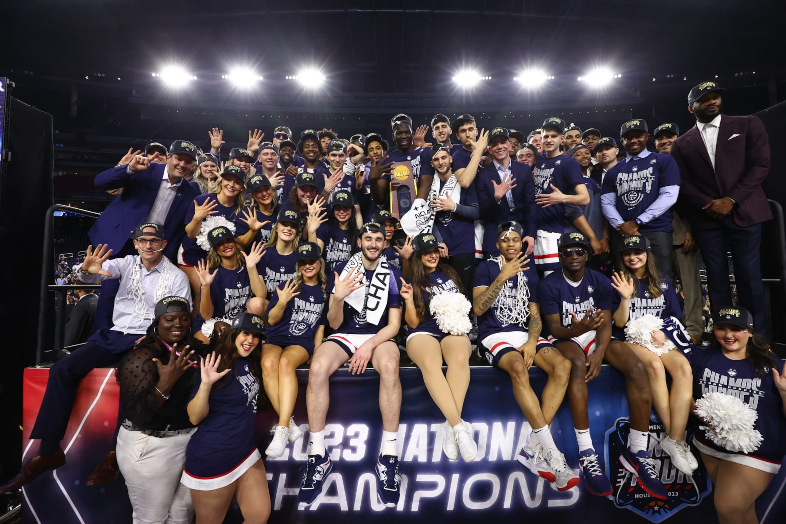 HOUSTON, TEXAS - APRIL 03: Connecticut Huskies poses for a team photo after the NCAA Men's Basketball Tournament National Championship game at NRG Stadium on April 03, 2023 in Houston, Texas. (Photo by Jamie Schwaberow/NCAA Photos via Getty Images)