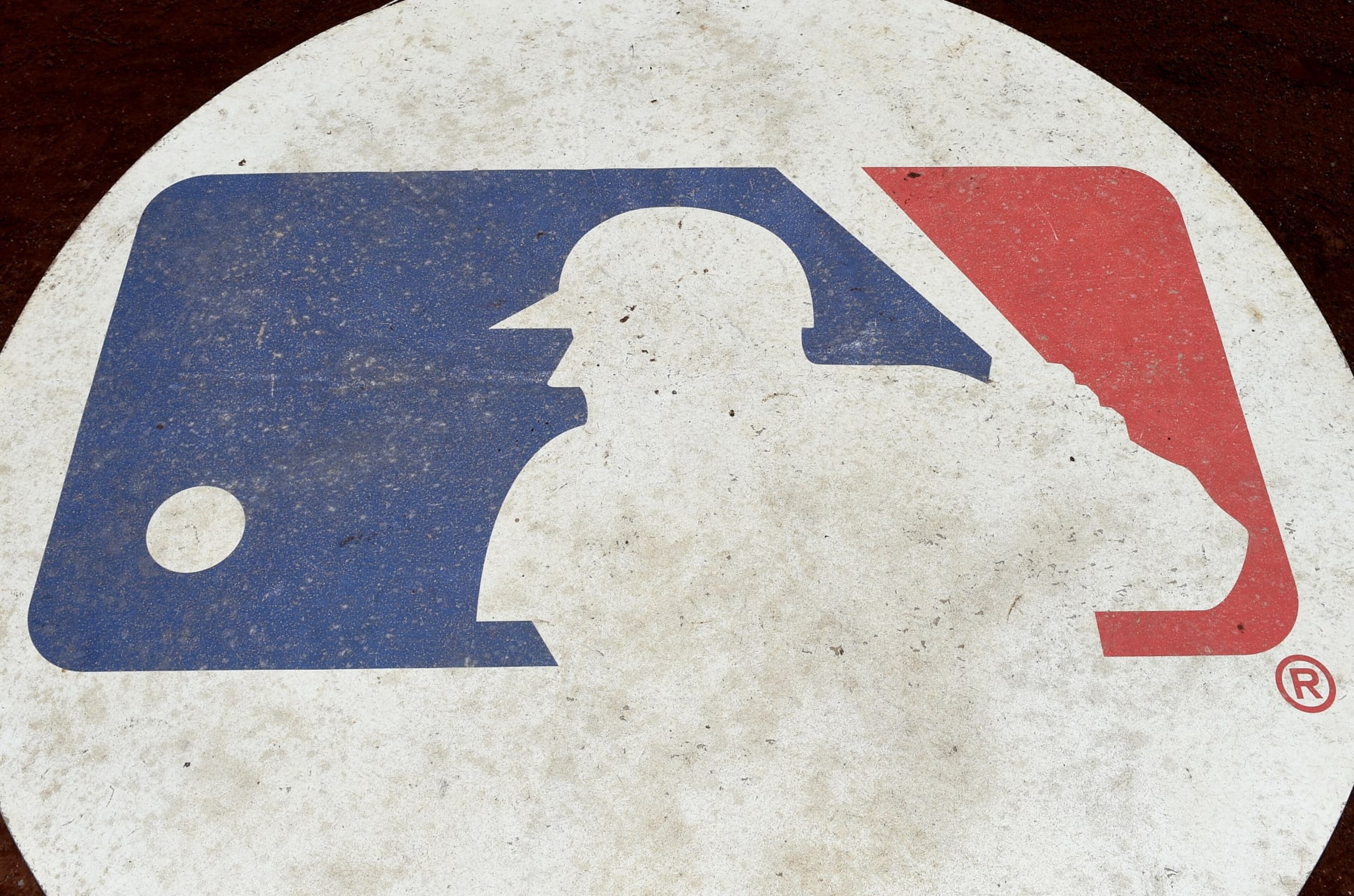 WASHINGTON, DC - JUNE 12: The MLB logo in the on deck circle during the game between the Washington Nationals and the Milwaukee Brewers at Nationals Park on June 12, 2022 in Washington, DC. (Photo by G Fiume/Getty Images)