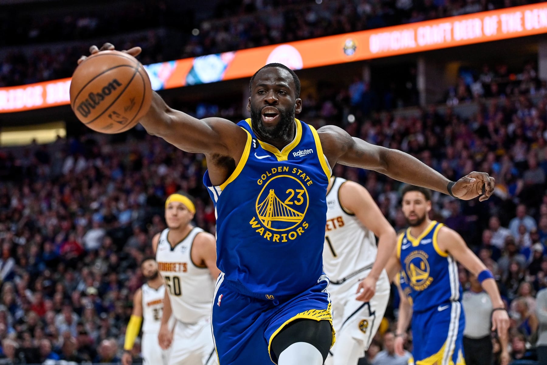 DENVER, CO - APRIL 2: Draymond Green #23 of the Golden State Warriors collects a defensive rebound in the first half of a game against the Denver Nuggets at Ball Arena on April 2, 2023 in Denver, Colorado. NOTE TO USER: User expressly acknowledges and agrees that, by downloading and or using this photograph, User is consenting to the terms and conditions of the Getty Images License Agreement. (Photo by Dustin Bradford/Getty Images)
