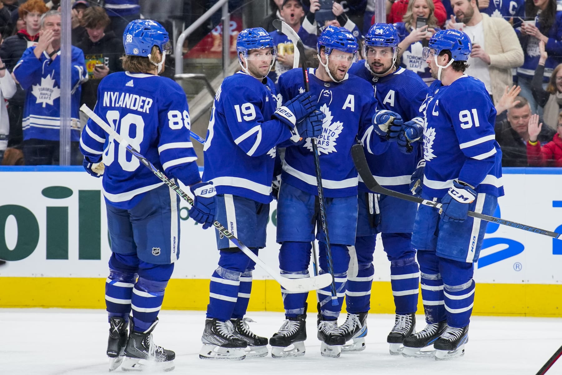 TORONTO, ON - APRIL 2: John Tavares #91 of the Toronto Maple Leafs celebrates his goal against the Detroit Red Wings with teammates Auston Matthews #34, Morgan Rielly #44, Calle Jarnkrok #19 and William Nylander #88 during the third period at the Scotiabank Arena on April 2, 2023 in Toronto, Ontario, Canada. (Photo by Andrew Lahodynskyj/NHLI via Getty Images)