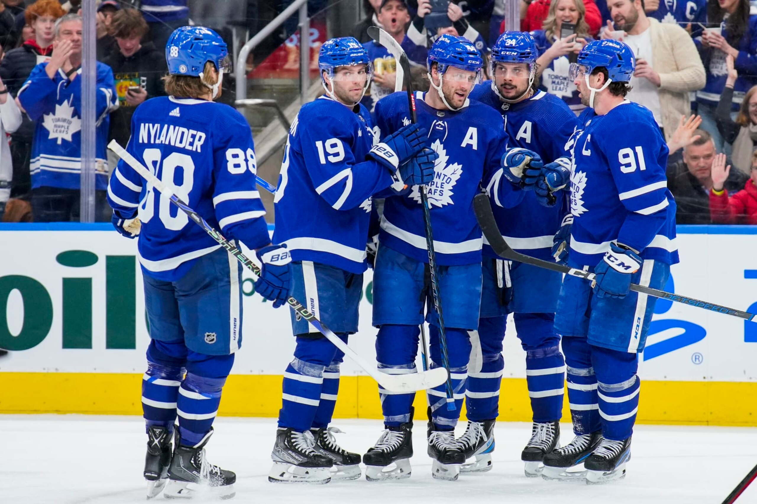TORONTO, ON - APRIL 2: John Tavares #91 of the Toronto Maple Leafs celebrates his goal against the Detroit Red Wings with teammates Auston Matthews #34, Morgan Rielly #44, Calle Jarnkrok #19 and William Nylander #88 during the third period at the Scotiabank Arena on April 2, 2023 in Toronto, Ontario, Canada. (Photo by Andrew Lahodynskyj/NHLI via Getty Images)