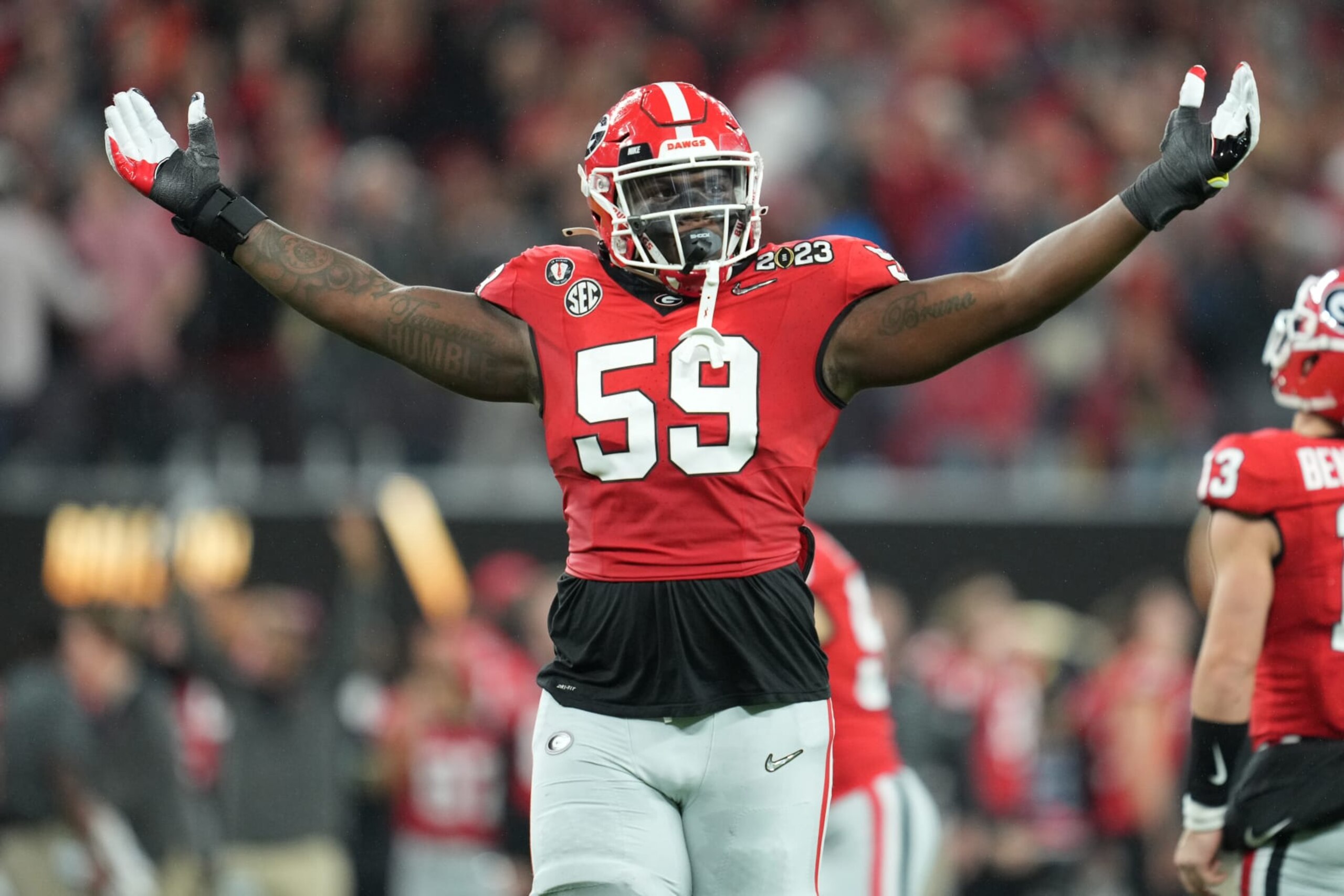 INGLEWOOD, CA - JANUARY 09: Georgia Bulldogs offensive lineman Broderick Jones (59) celebrates after a touchdown play in action during the 2023 CFP National Championship game between the Georgia Bulldogs and the TCU Horned Frogs on January 09, 2023, at SoFi Stadium in Inglewood, CA. (Photo by Robin Alam/Icon Sportswire via Getty Images) INGLEWOOD, CA - JANUARY 09: Georgia Bulldogs offensive lineman Broderick Jones (59) celebrates after a touchdown play in action during the 2023 CFP National Championship game between the Georgia Bulldogs and the TCU Horned Frogs on January 09, 2023, at SoFi Stadium in Inglewood, CA. (Photo by Robin Alam/Icon Sportswire via Getty Images)