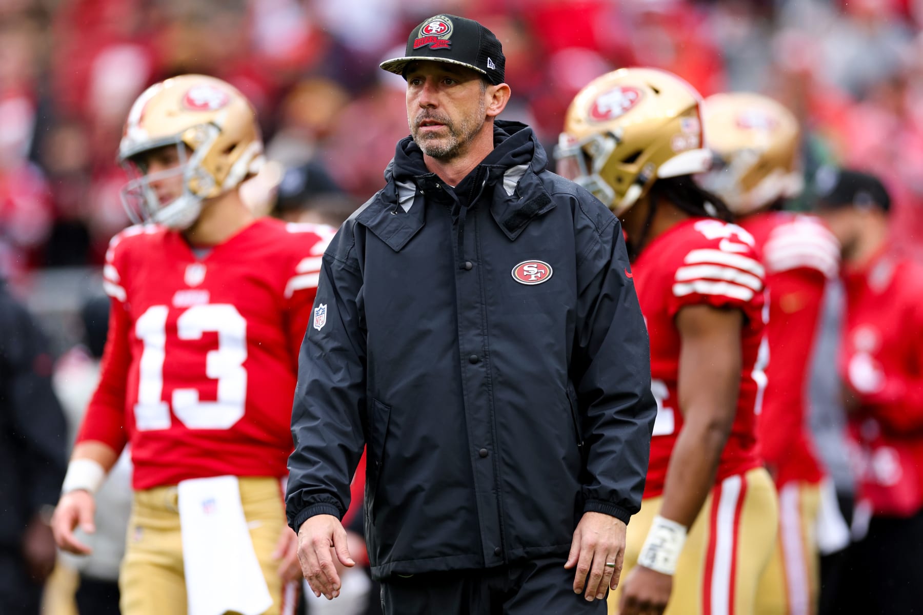 SANTA CLARA, CALIFORNIA - JANUARY 14: Head coach Kyle Shanahan of the San Francisco 49ers looks on prior to a game against the Seattle Seahawks in the NFC Wild Card playoff game at Levi's Stadium on January 14, 2023 in Santa Clara, California. (Photo by Ezra Shaw/Getty Images)