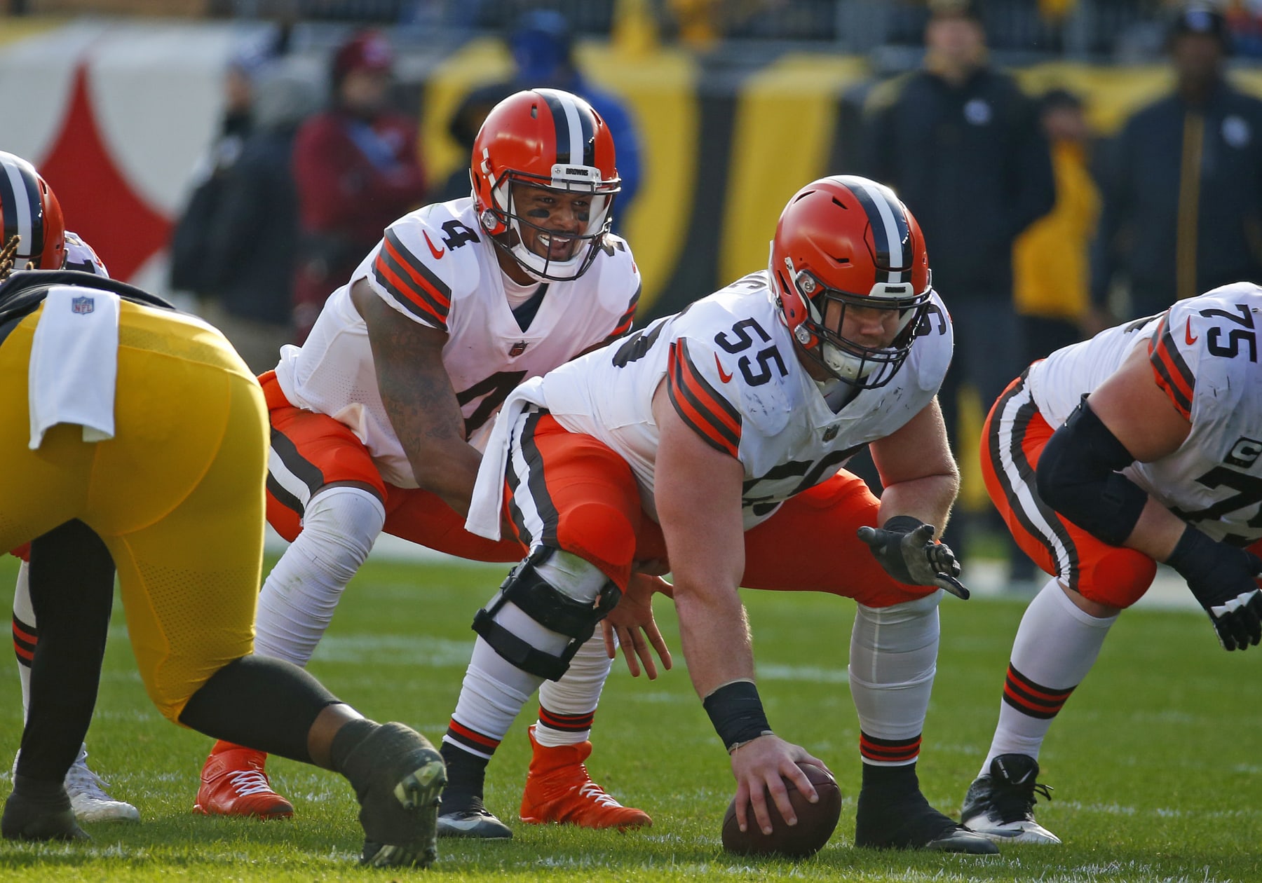 PITTSBURGH, PA - JANUARY 08:  Deshaun Watson #4 of the Cleveland Browns under center Ethan Pocic #55 of the Cleveland Browns in action against the Pittsburgh Steelers on January 8, 2022 at Acrisure Stadium in Pittsburgh, Pennsylvania.  (Photo by Justin K. Aller/Getty Images)