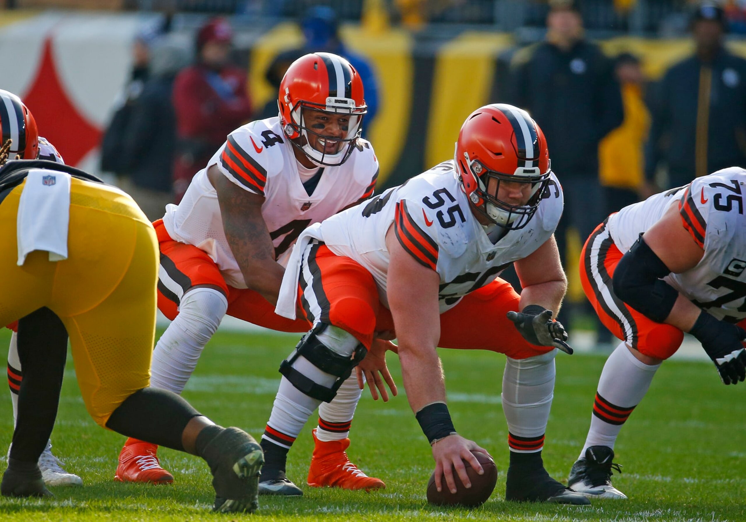 PITTSBURGH, PA - JANUARY 08:  Deshaun Watson #4 of the Cleveland Browns under center Ethan Pocic #55 of the Cleveland Browns in action against the Pittsburgh Steelers on January 8, 2022 at Acrisure Stadium in Pittsburgh, Pennsylvania.  (Photo by Justin K. Aller/Getty Images)