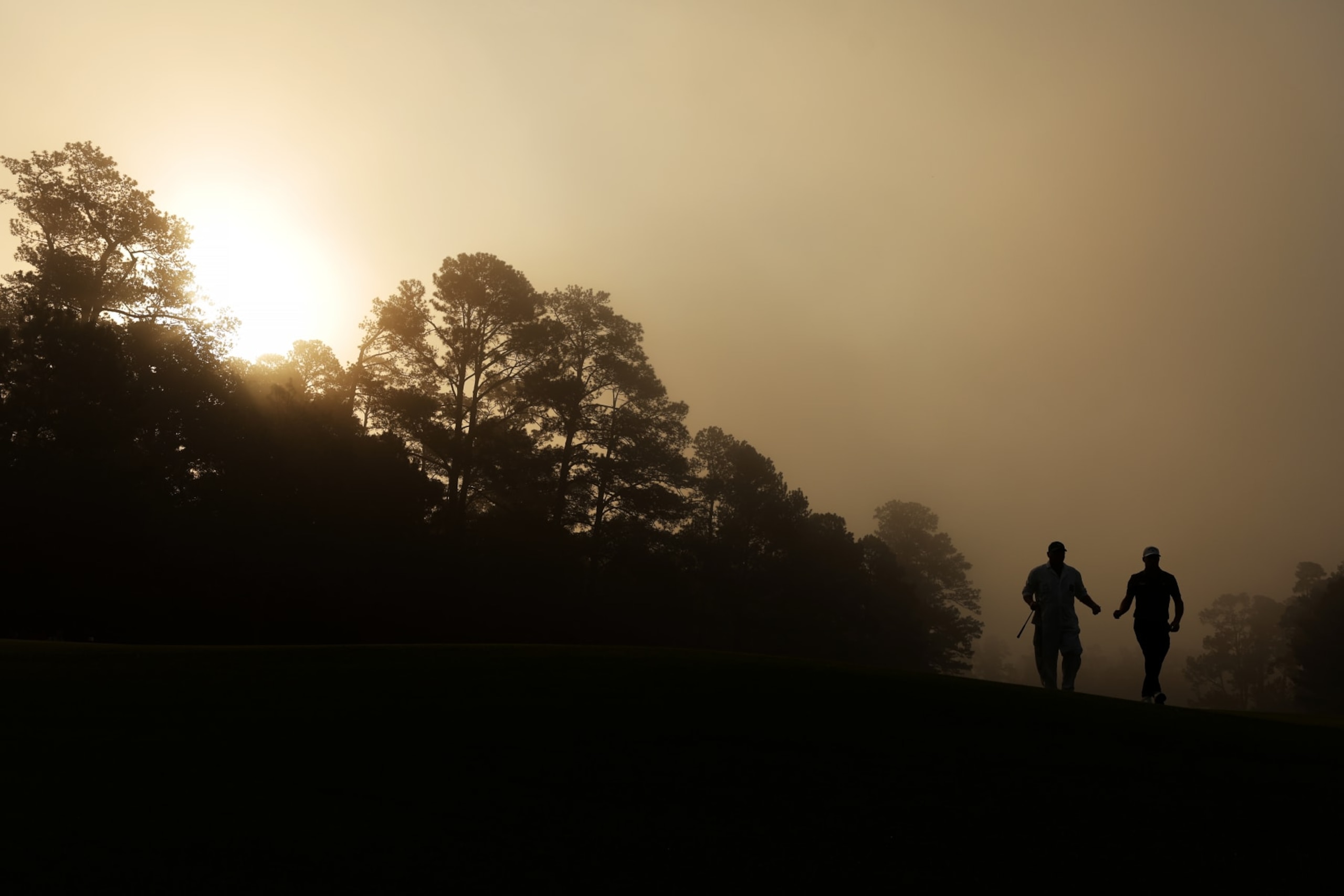 AUGUSTA, GEORGIA - APRIL 05: Alex Noren of Sweden walks off the first green with his caddie during a practice round prior to the 2023 Masters Tournament at Augusta National Golf Club on April 05, 2023 in Augusta, Georgia. (Photo by Christian Petersen/Getty Images)