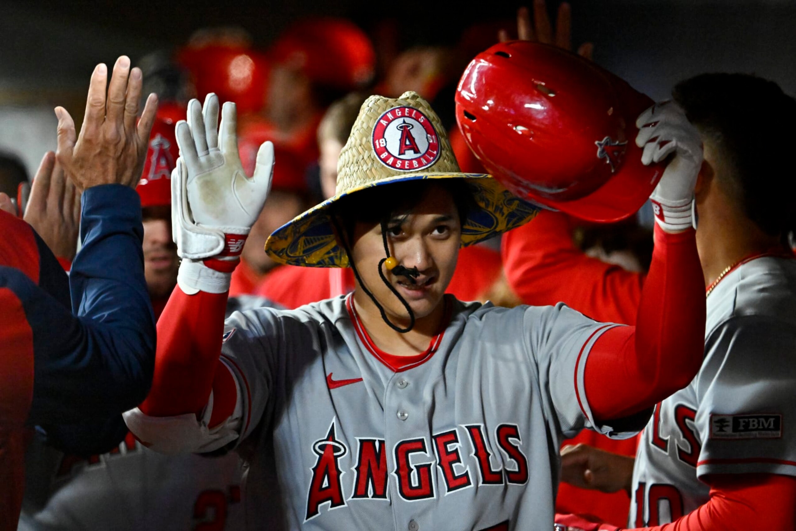SEATTLE, WASHINGTON - APRIL 03: Shohei Ohtani #17 of the Los Angeles Angels celebrates with teammates after hitting a two run home run during the fifth inning against the Seattle Mariners at T-Mobile Park on April 03, 2023 in Seattle, Washington. (Photo by Alika Jenner/Getty Images) SEATTLE, WASHINGTON - APRIL 03: Shohei Ohtani #17 of the Los Angeles Angels celebrates with teammates after hitting a two run home run during the fifth inning against the Seattle Mariners at T-Mobile Park on April 03, 2023 in Seattle, Washington. (Photo by Alika Jenner/Getty Images)