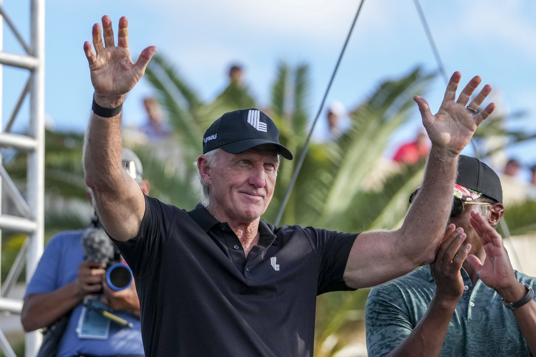 DORAL, FL - OCTOBER 30: Greg Norman, CEO and commissioner of LIV Golf, waves as being introduced to the crowd during the team championship stroke-play round of the LIV Golf Invitational - Miami at Trump National Doral Miami on October 30, 2022 in Doral, Florida. (Photo by Eric Espada/Getty Images)