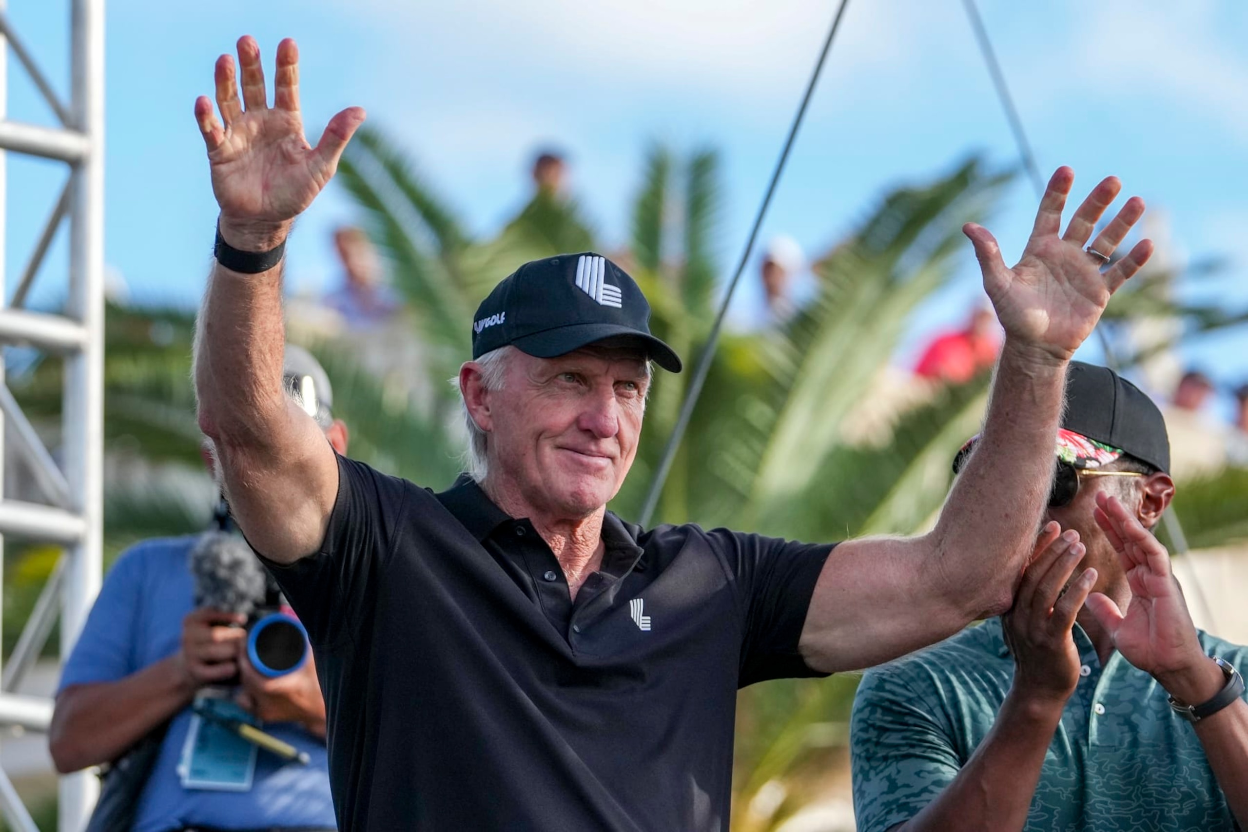 DORAL, FL - OCTOBER 30: Greg Norman, CEO and commissioner of LIV Golf, waves as being introduced to the crowd during the team championship stroke-play round of the LIV Golf Invitational - Miami at Trump National Doral Miami on October 30, 2022 in Doral, Florida. (Photo by Eric Espada/Getty Images) DORAL, FL - OCTOBER 30: Greg Norman, CEO and commissioner of LIV Golf, waves as being introduced to the crowd during the team championship stroke-play round of the LIV Golf Invitational - Miami at Trump National Doral Miami on October 30, 2022 in Doral, Florida. (Photo by Eric Espada/Getty Images)