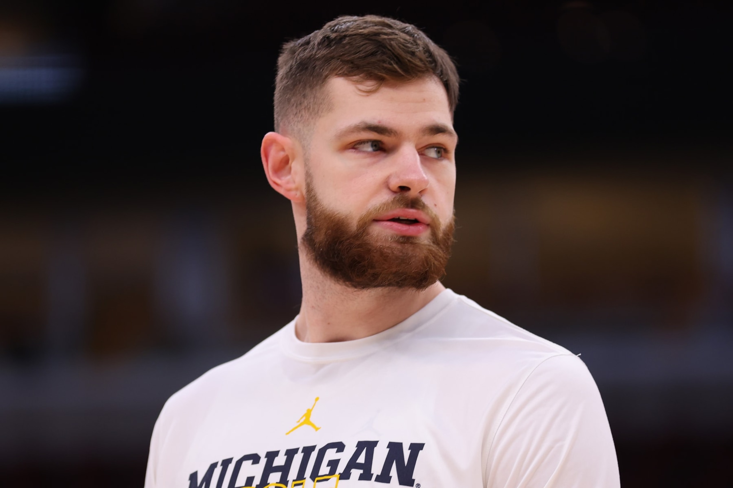 CHICAGO, ILLINOIS - MARCH 09: Hunter Dickinson #1 of the Michigan Wolverines looks on prior to the second round of the Big Ten Tournament against the Rutgers Scarlet Knights at United Center on March 09, 2023 in Chicago, Illinois. (Photo by Michael Reaves/Getty Images) CHICAGO, ILLINOIS - MARCH 09: Hunter Dickinson #1 of the Michigan Wolverines looks on prior to the second round of the Big Ten Tournament against the Rutgers Scarlet Knights at United Center on March 09, 2023 in Chicago, Illinois. (Photo by Michael Reaves/Getty Images)