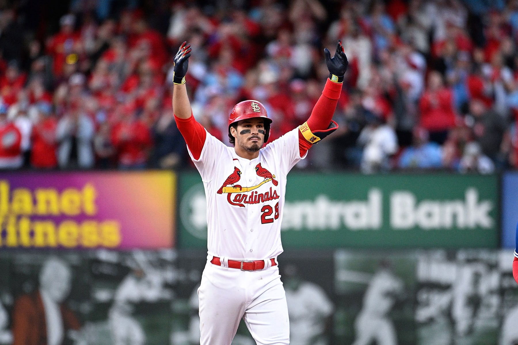 ST LOUIS, MO - MARCH 30: Nolan Arenado #28 of the St. Louis Cardinals reacts after hitting a ground rule double which scored two runs against the Toronto Blue Jays in the eighth inning on Opening Day at Busch Stadium on March 30, 2023 in St Louis, Missouri. (Photo by Joe Puetz/Getty Images)